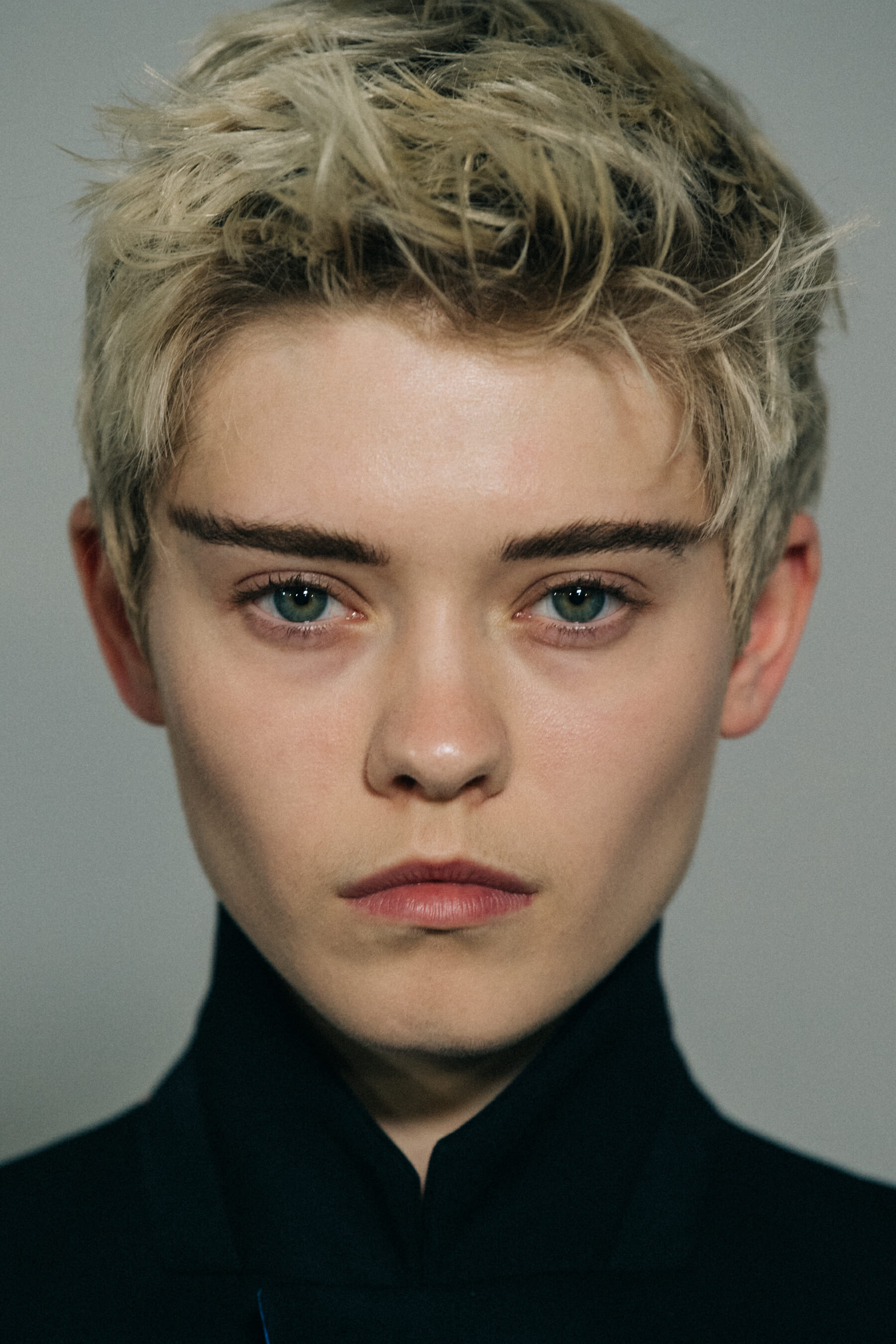 Model with large eyebrows at Haider Ackermann