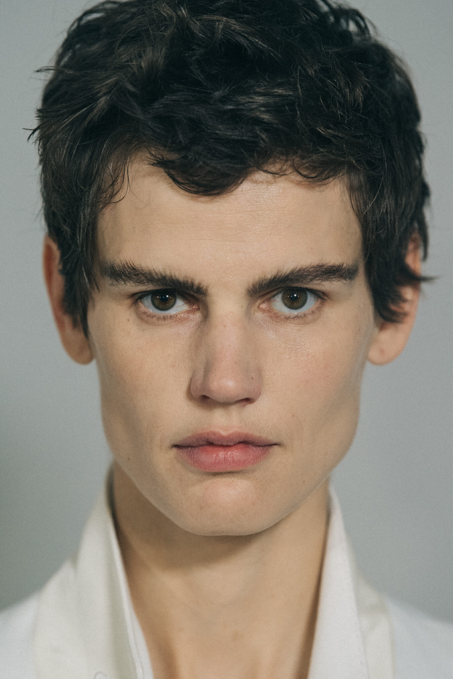 Model wearing white outfit at Haider Ackermann