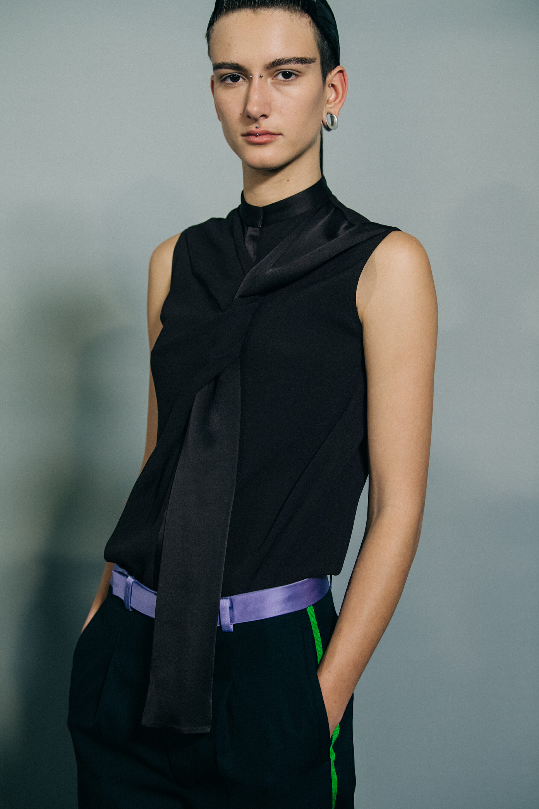 Model wearing black vest at Haider Ackermann