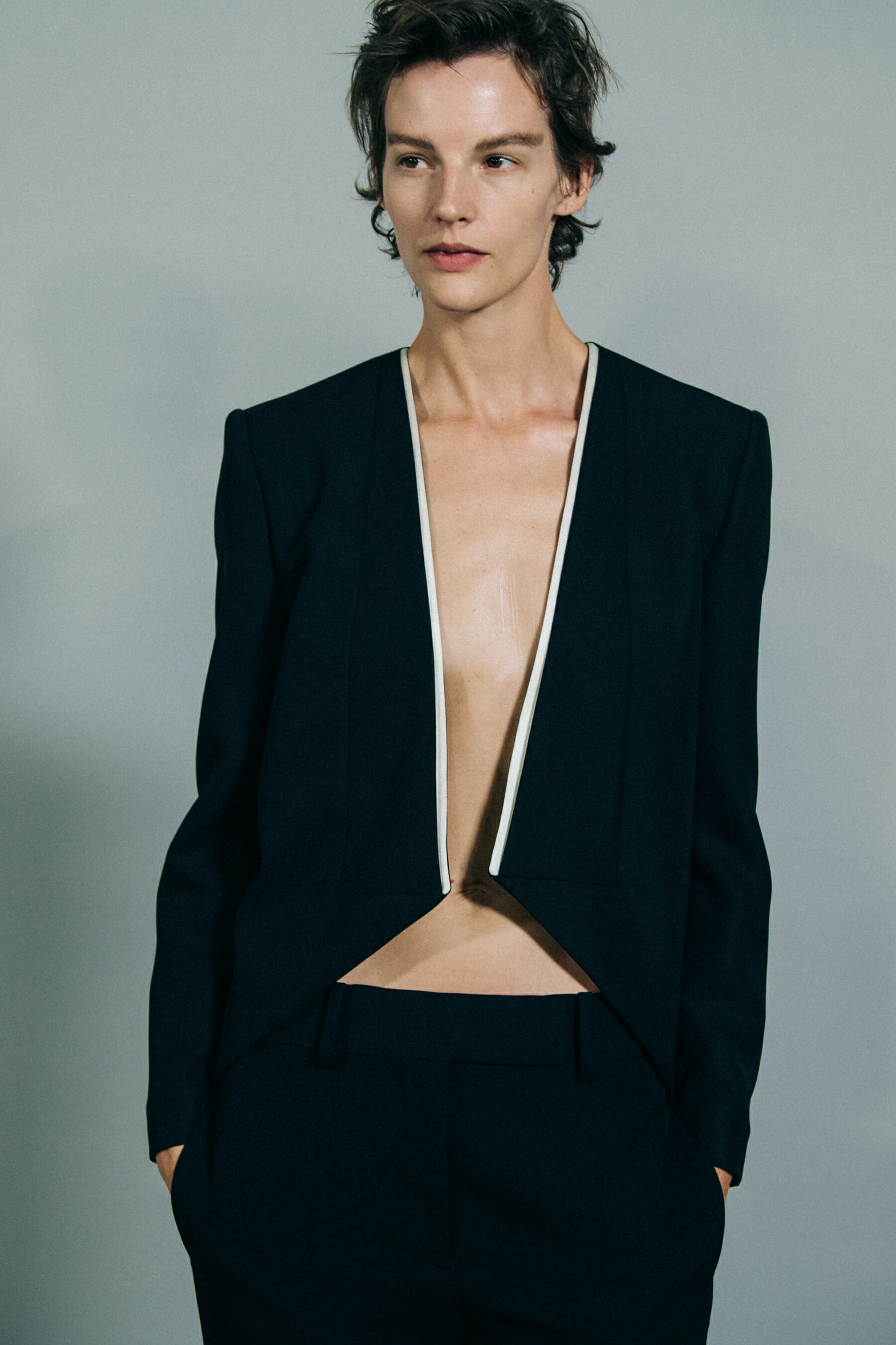 Model wearing black outfit at Haider Ackermann