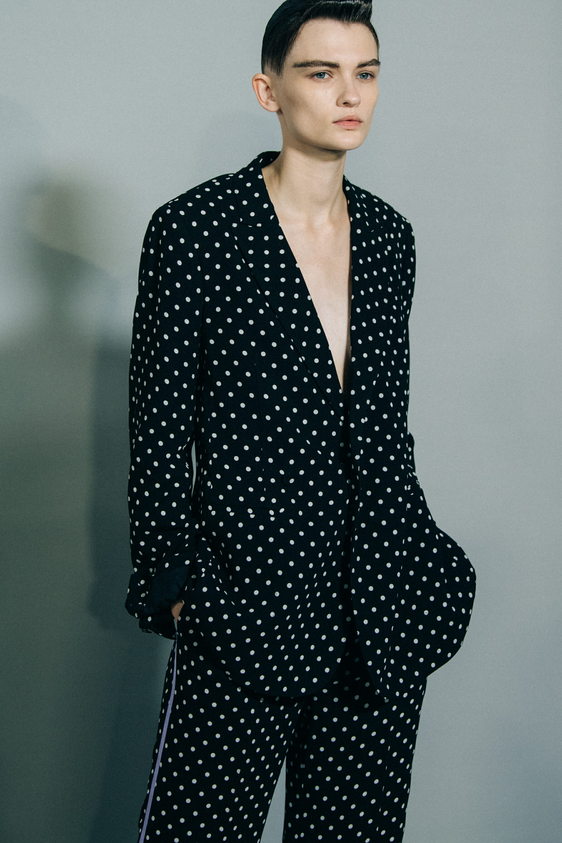 Model wearing polka dot outfit at Haider Ackermann