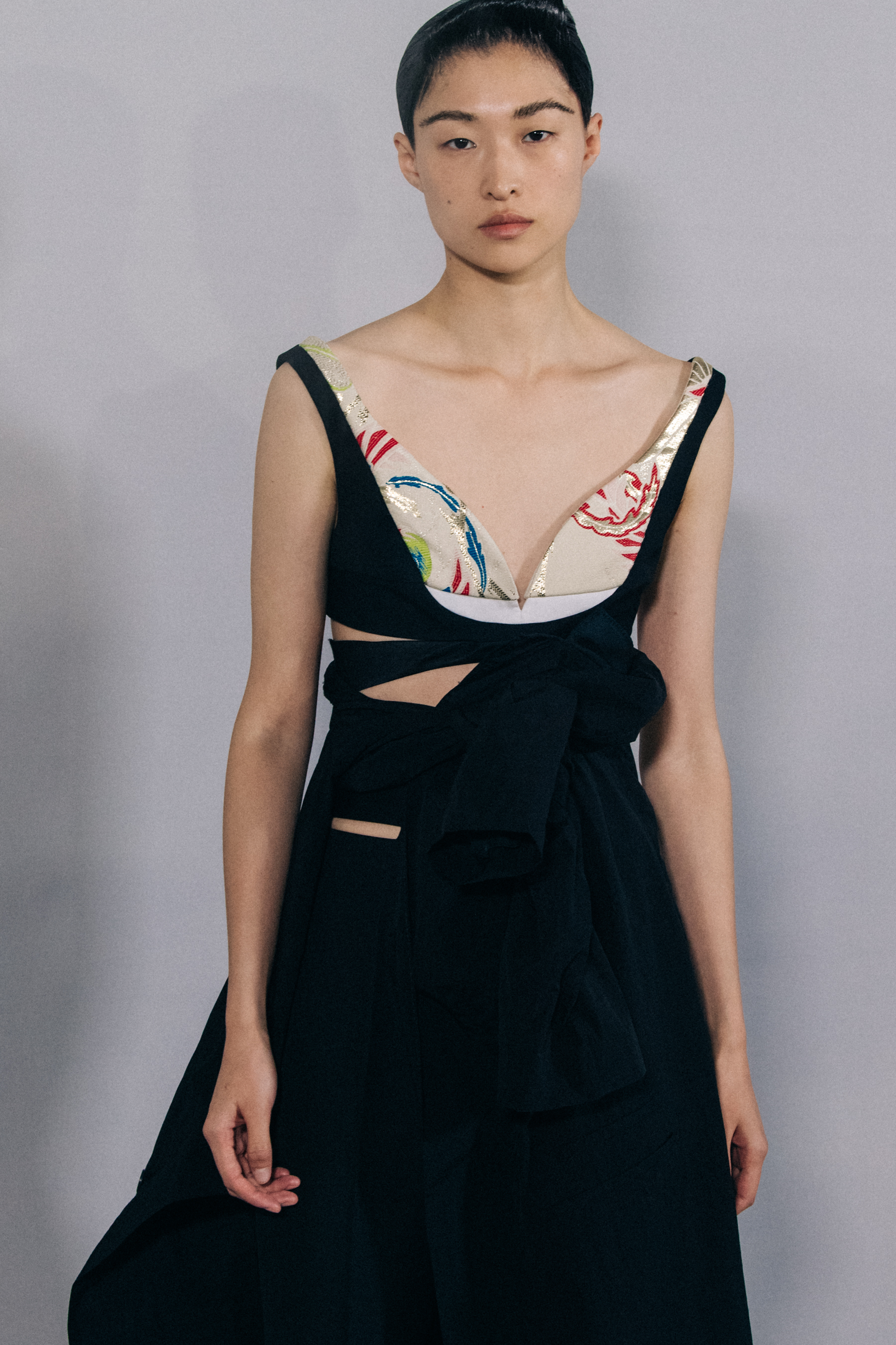 Model wearing black dress at Haider Ackermann