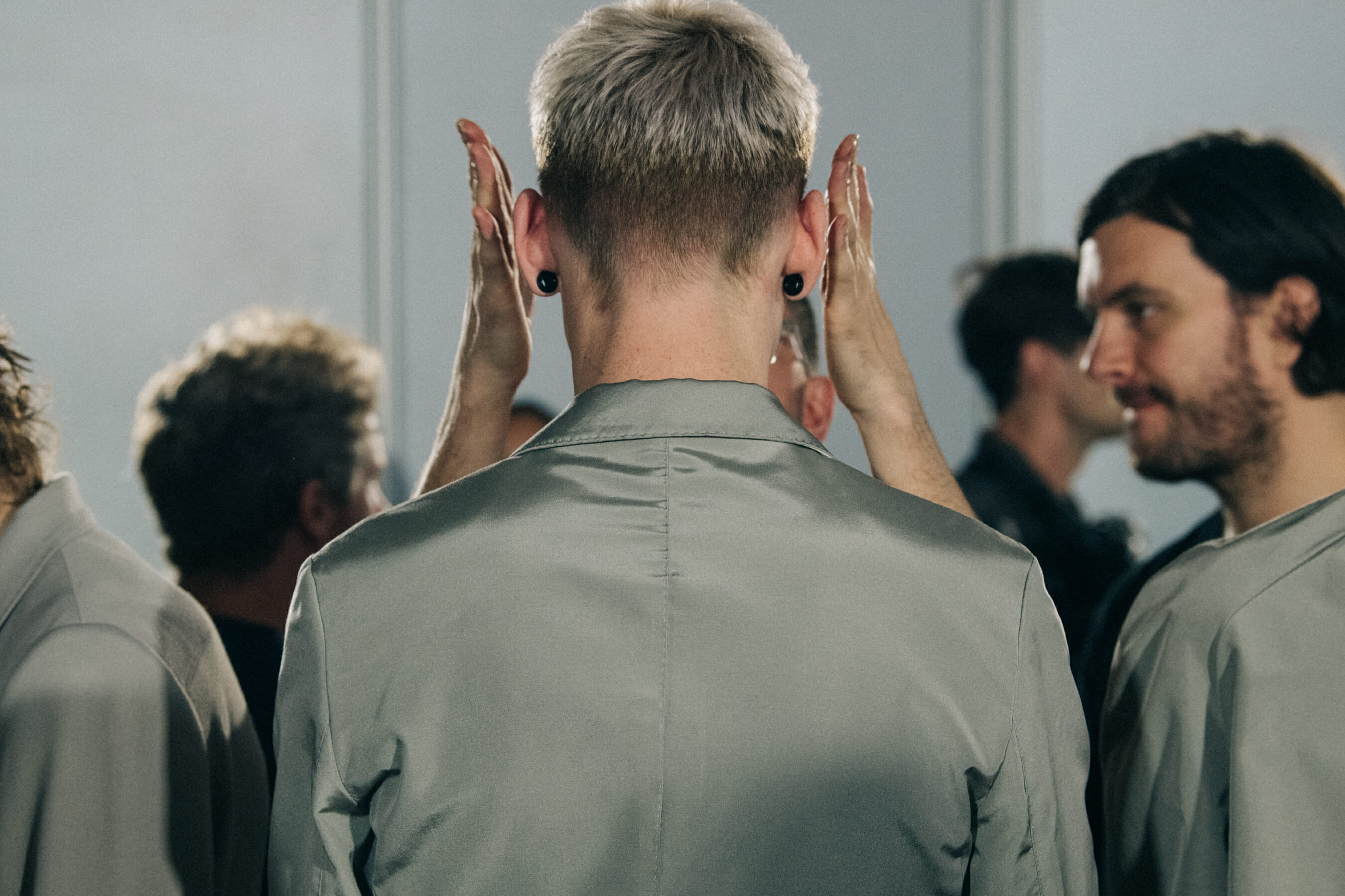 Model in hair and makeup backstage
