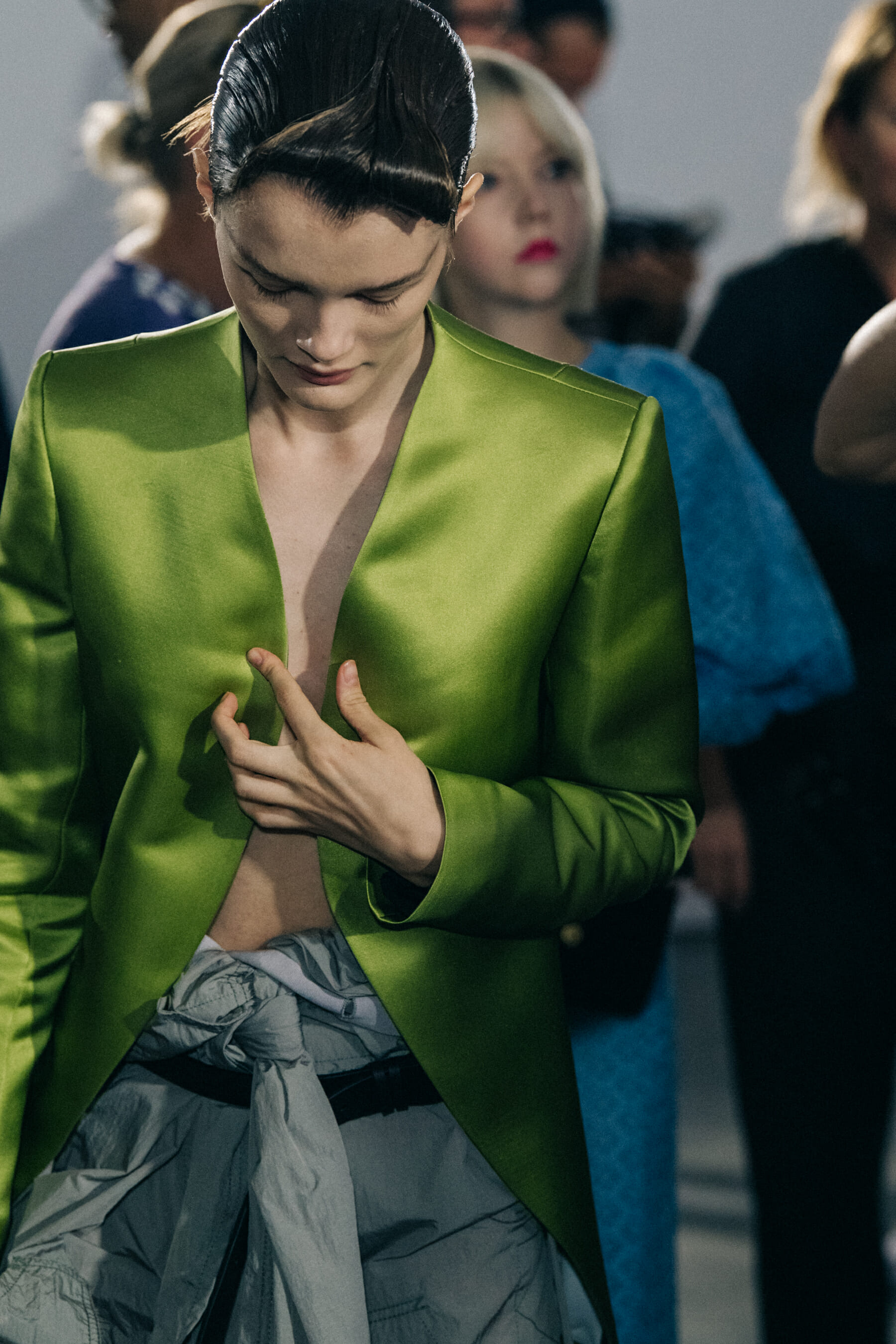 Model wearing green shirt at Haider Ackermann