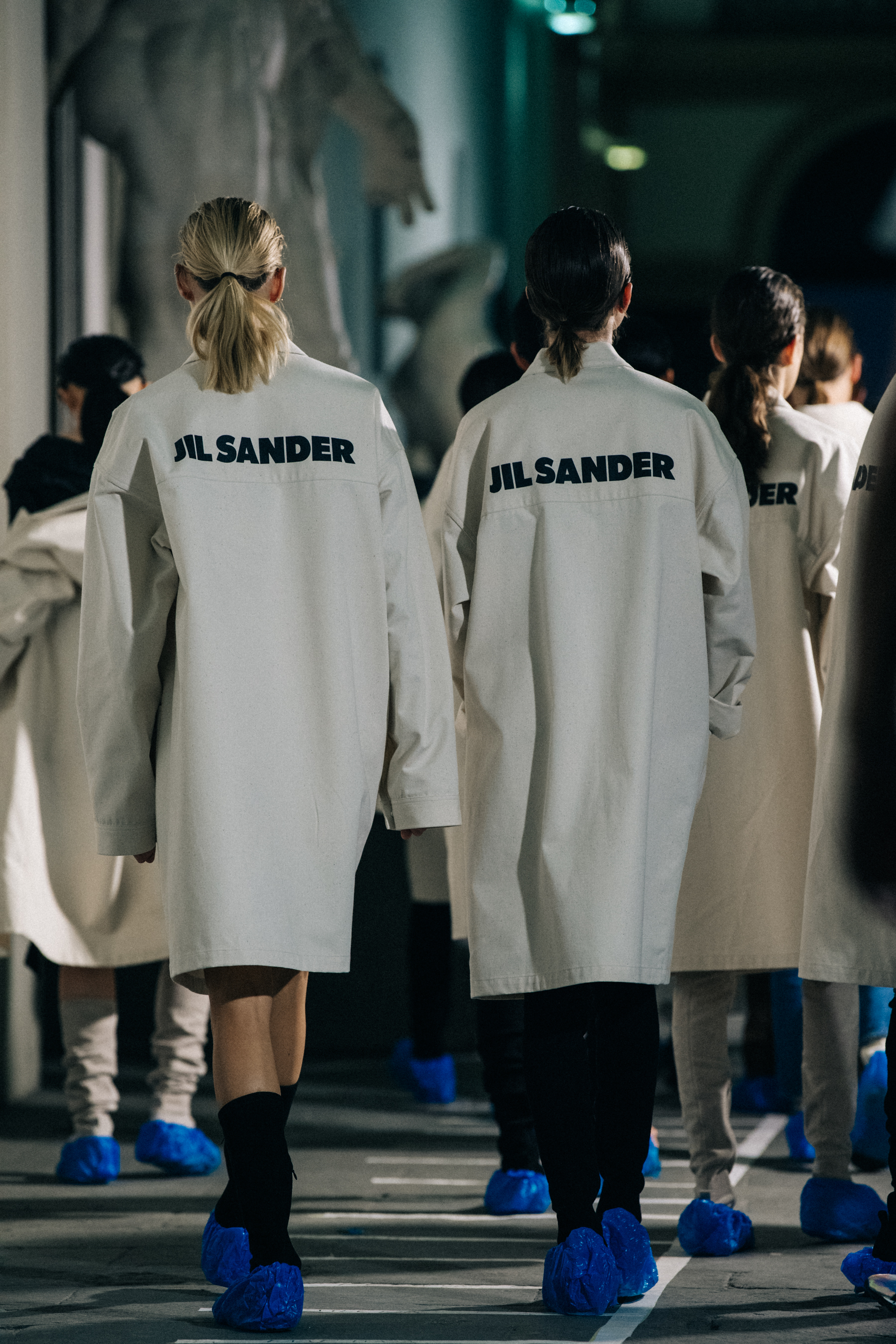 Models wearing white Jil Sander outfits