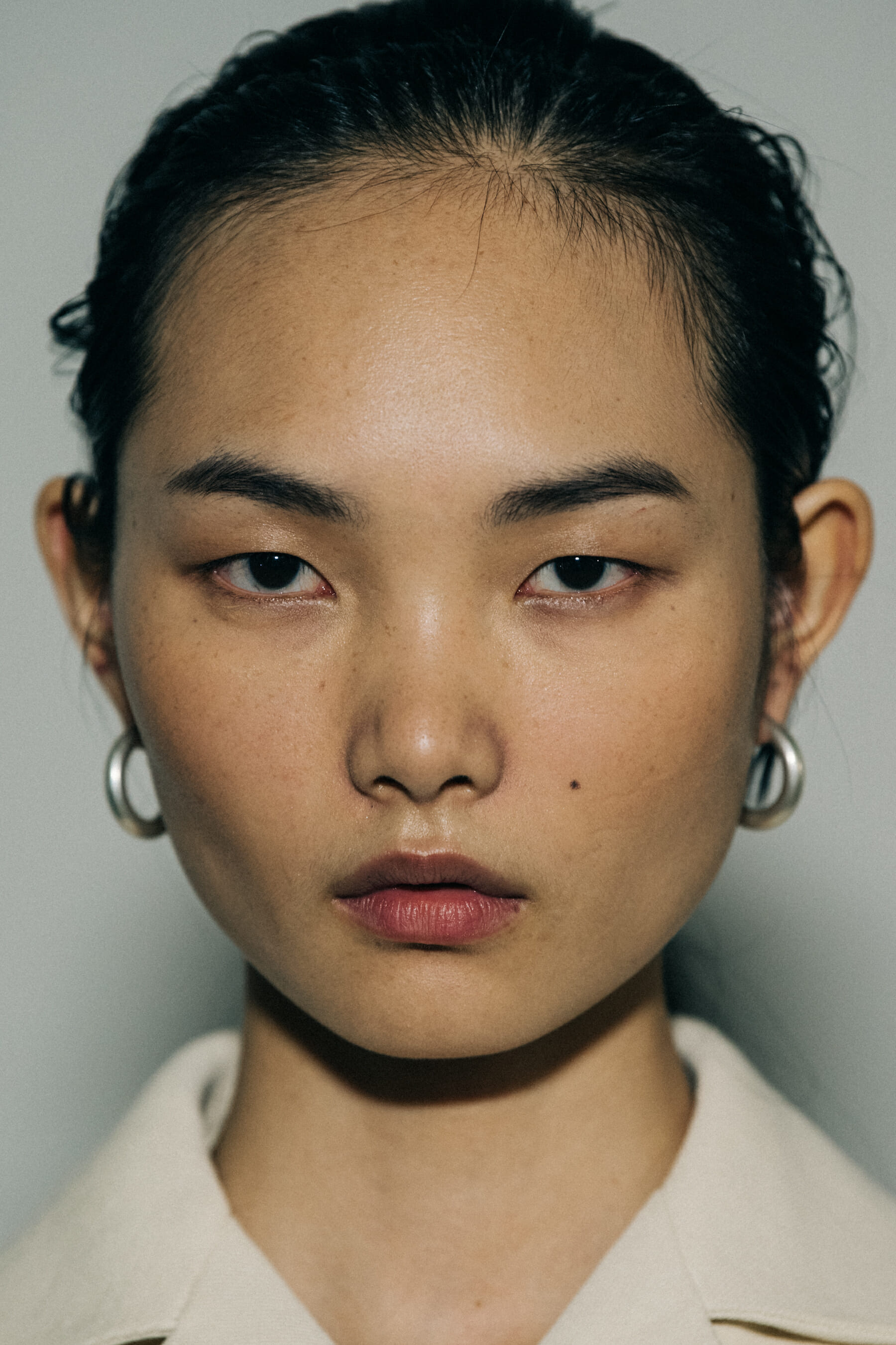 Portrait of model wearing earrings