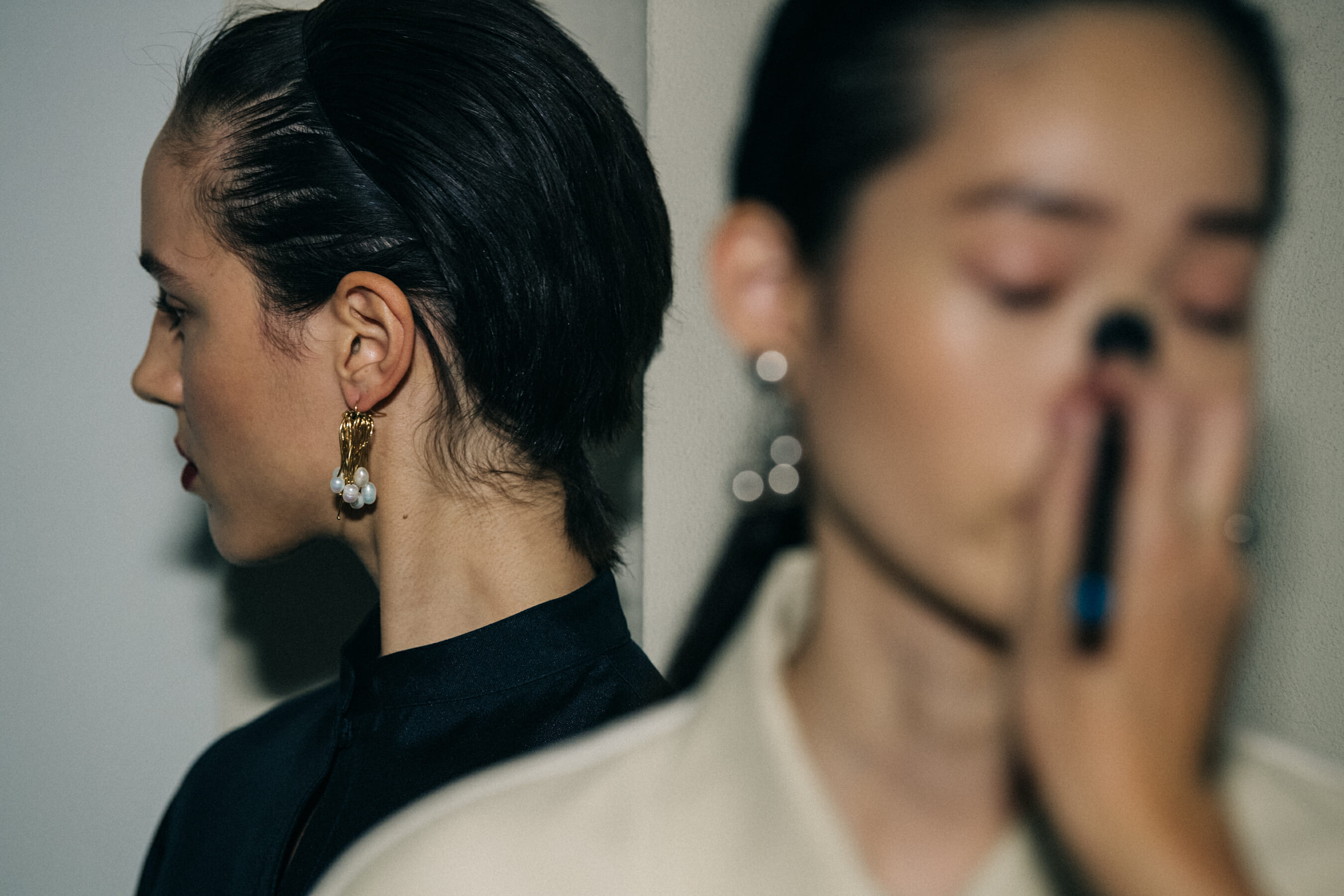 Models in hair and makeup at Jil Sander