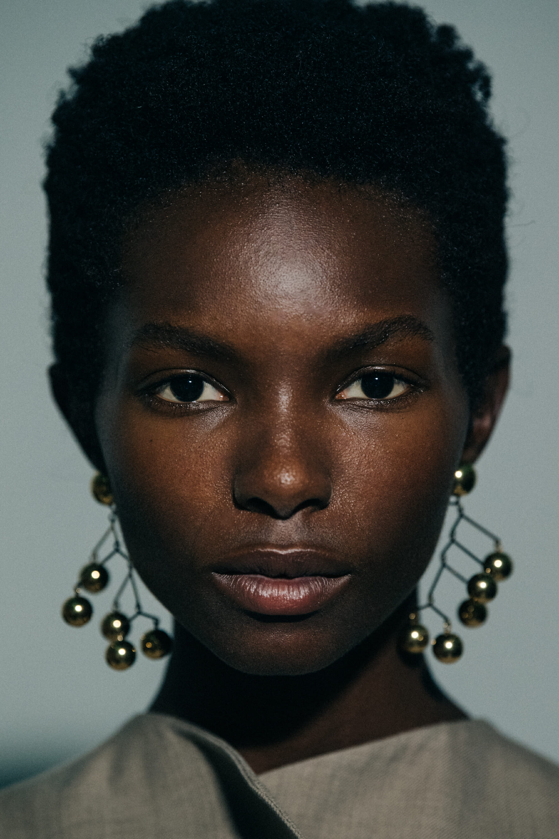 Portrait of model wearing earrings