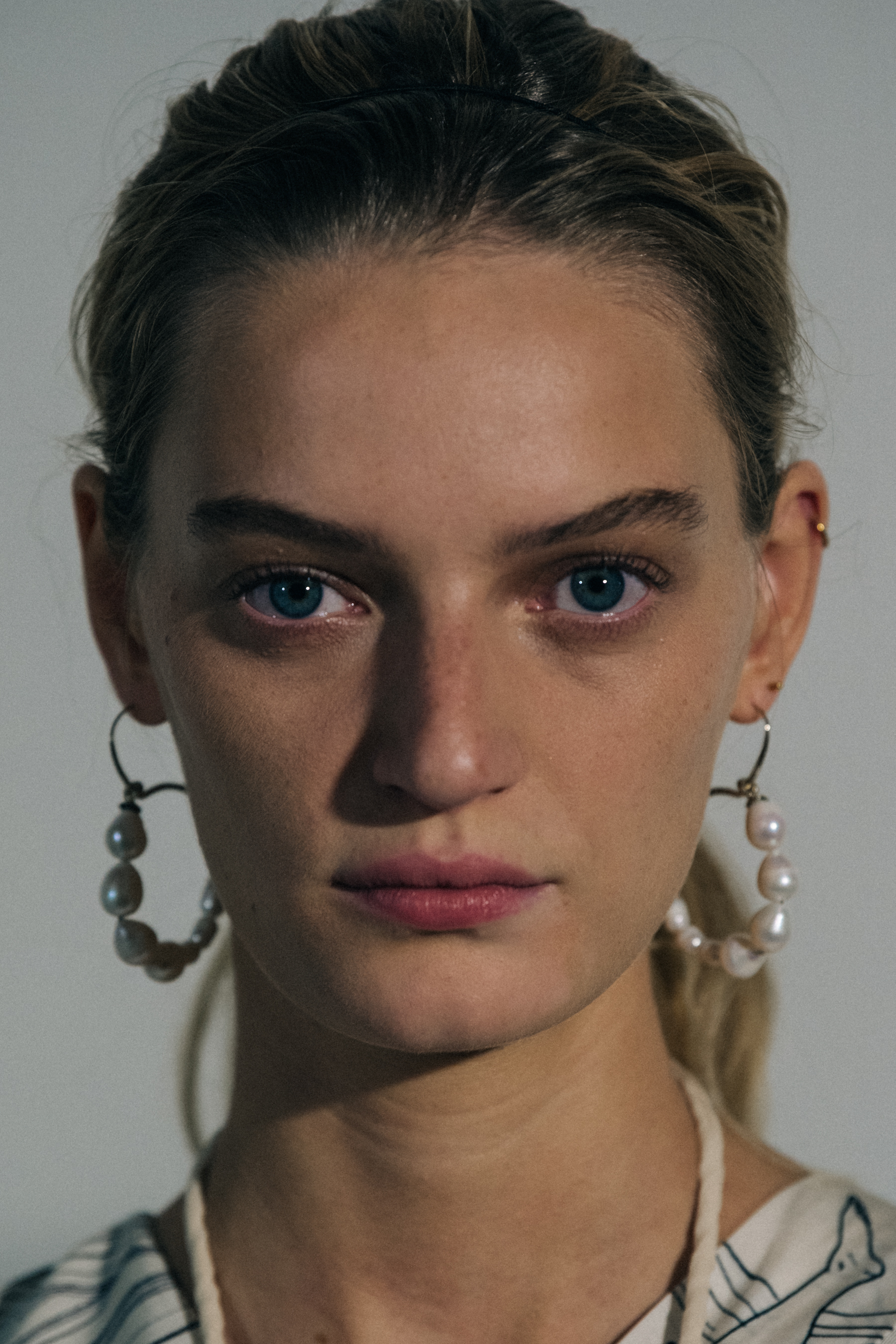 Portrait of model wearing earrings