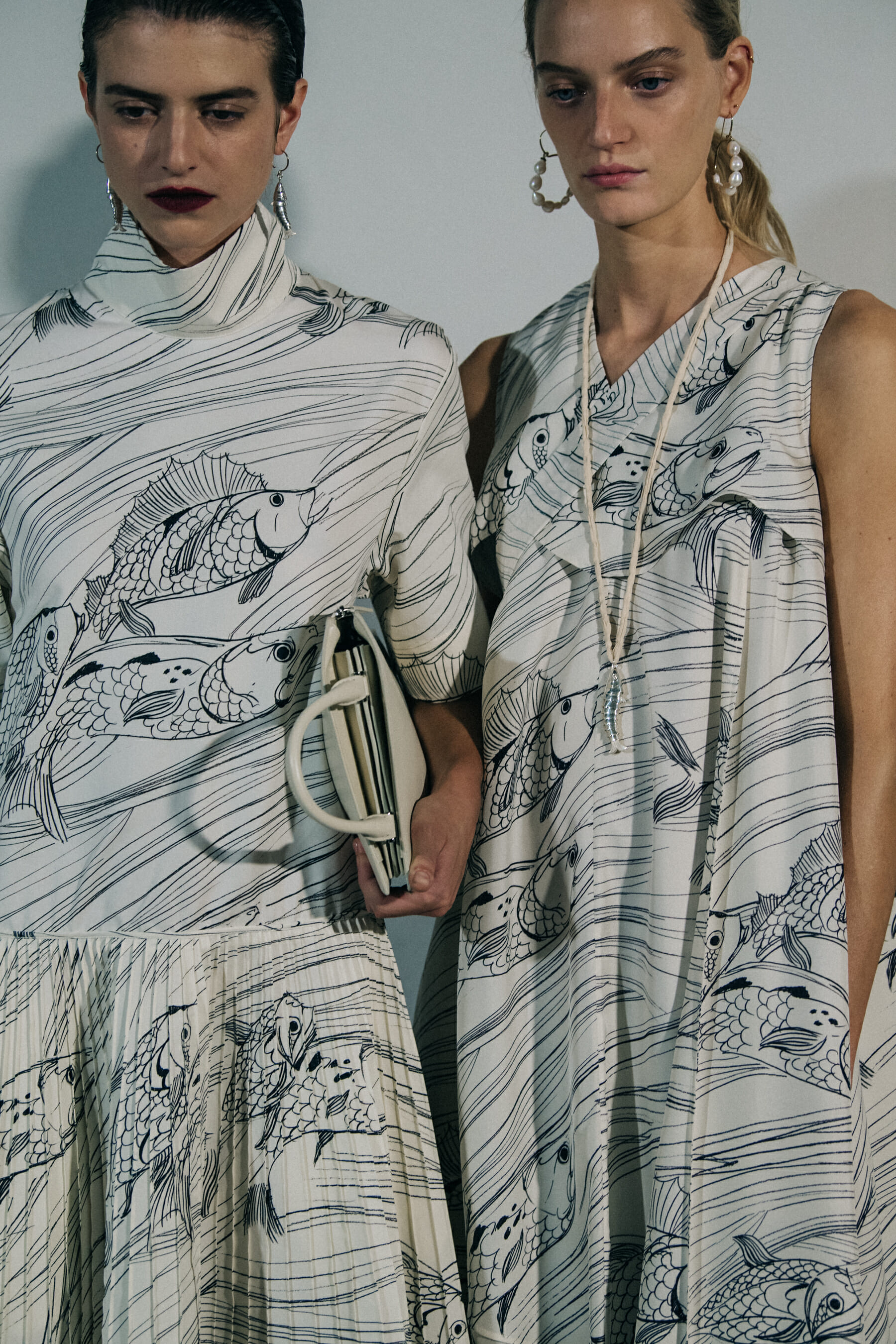 Models wearing white Jil Sander outfits