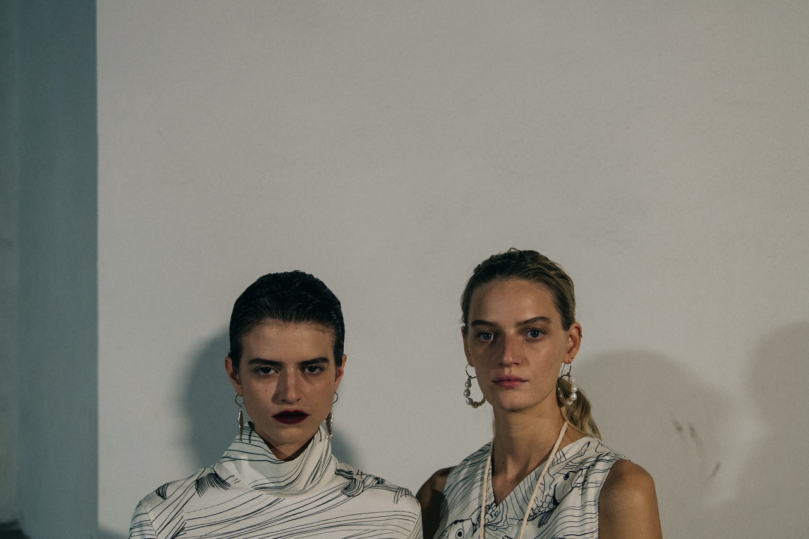 Models wearing white Jil Sander outfits