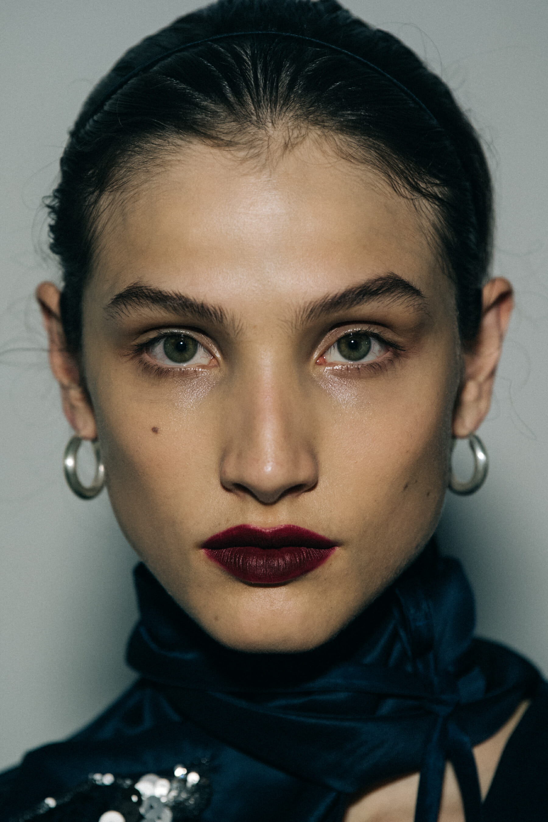 Portrait of model wearing earrings