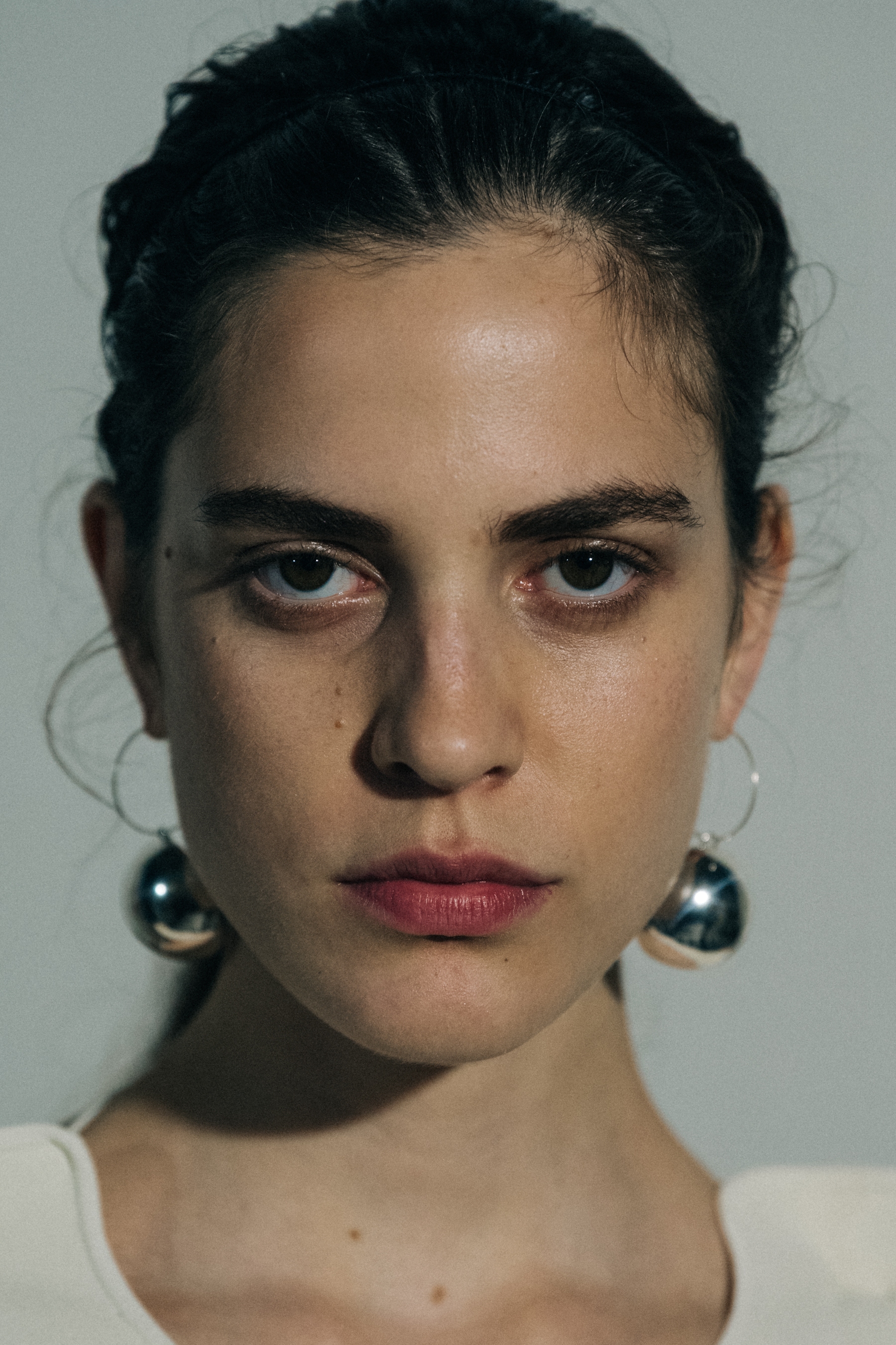 Portrait of model wearing earrings