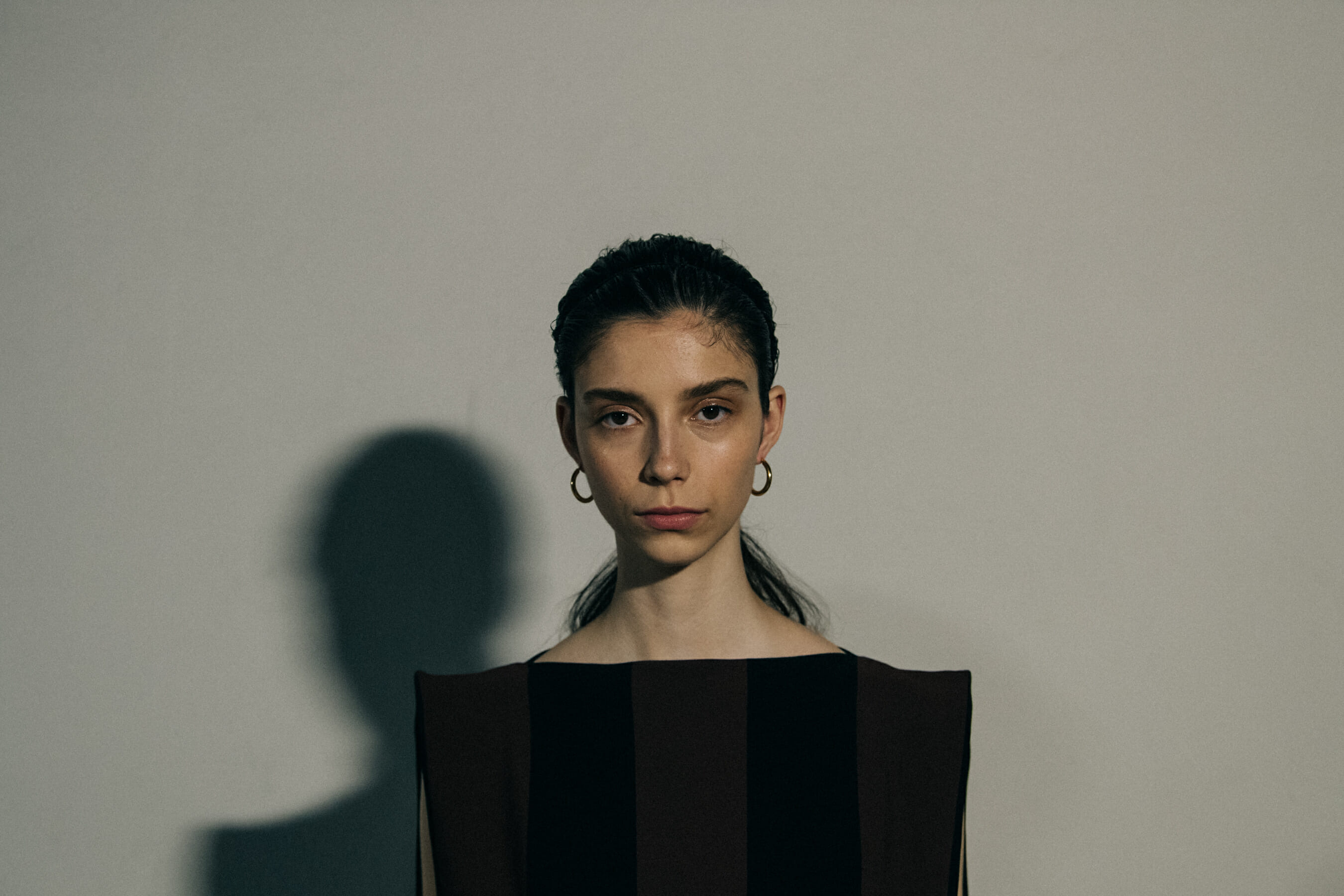 Models wearing black Jil Sander outfits