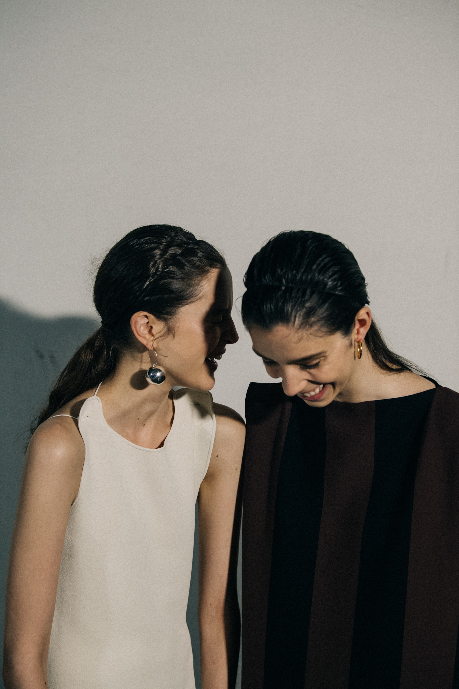 Models wearing black Jil Sander outfits