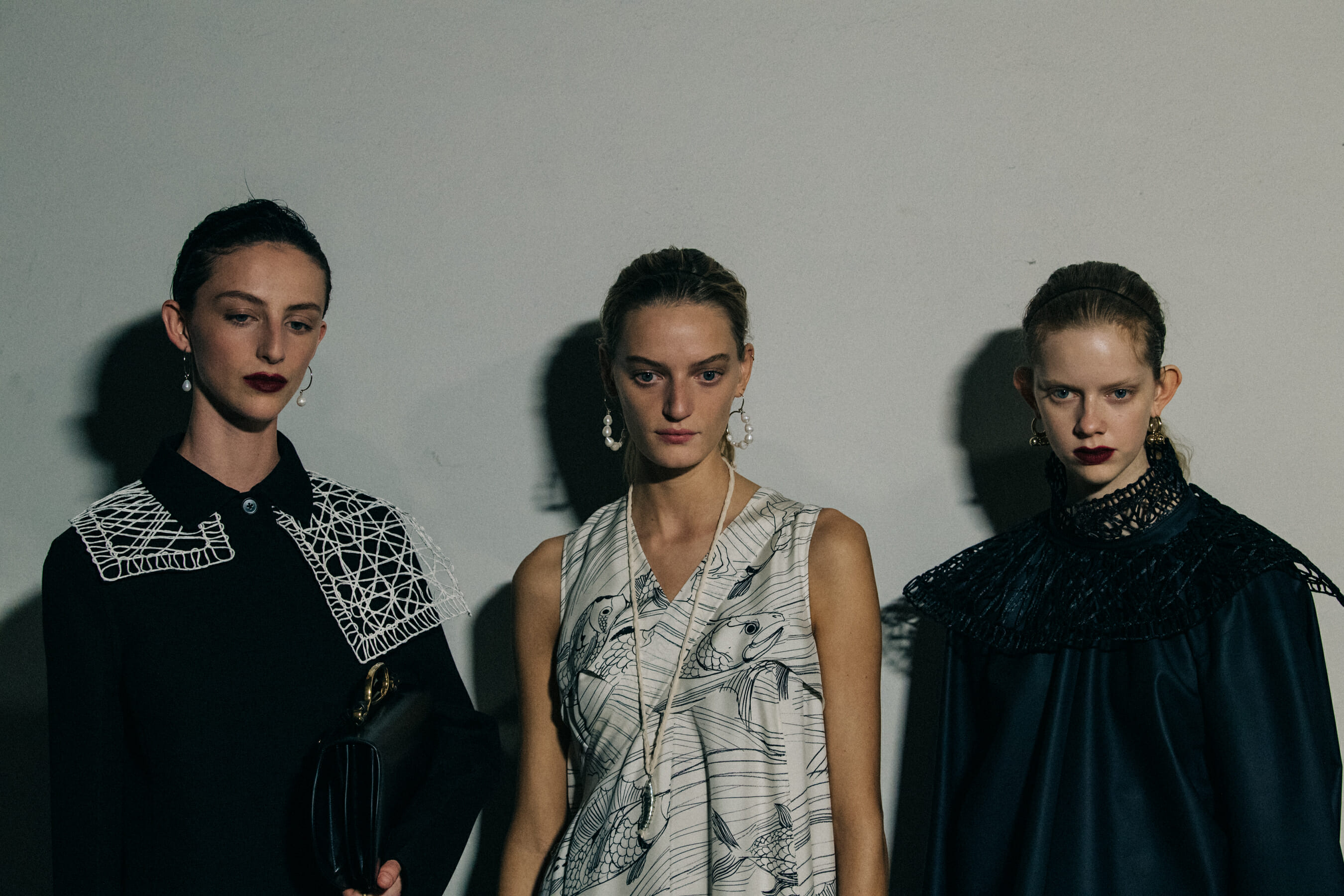 Models wearing black Jil Sander outfits