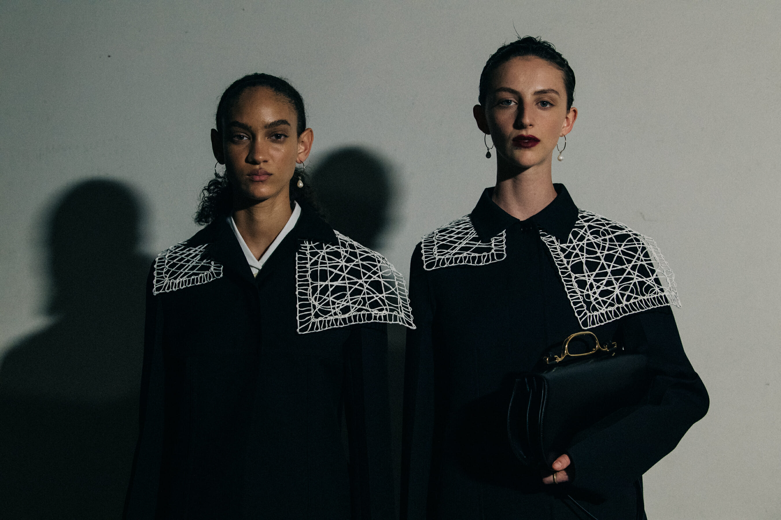 Models wearing black Jil Sander outfits