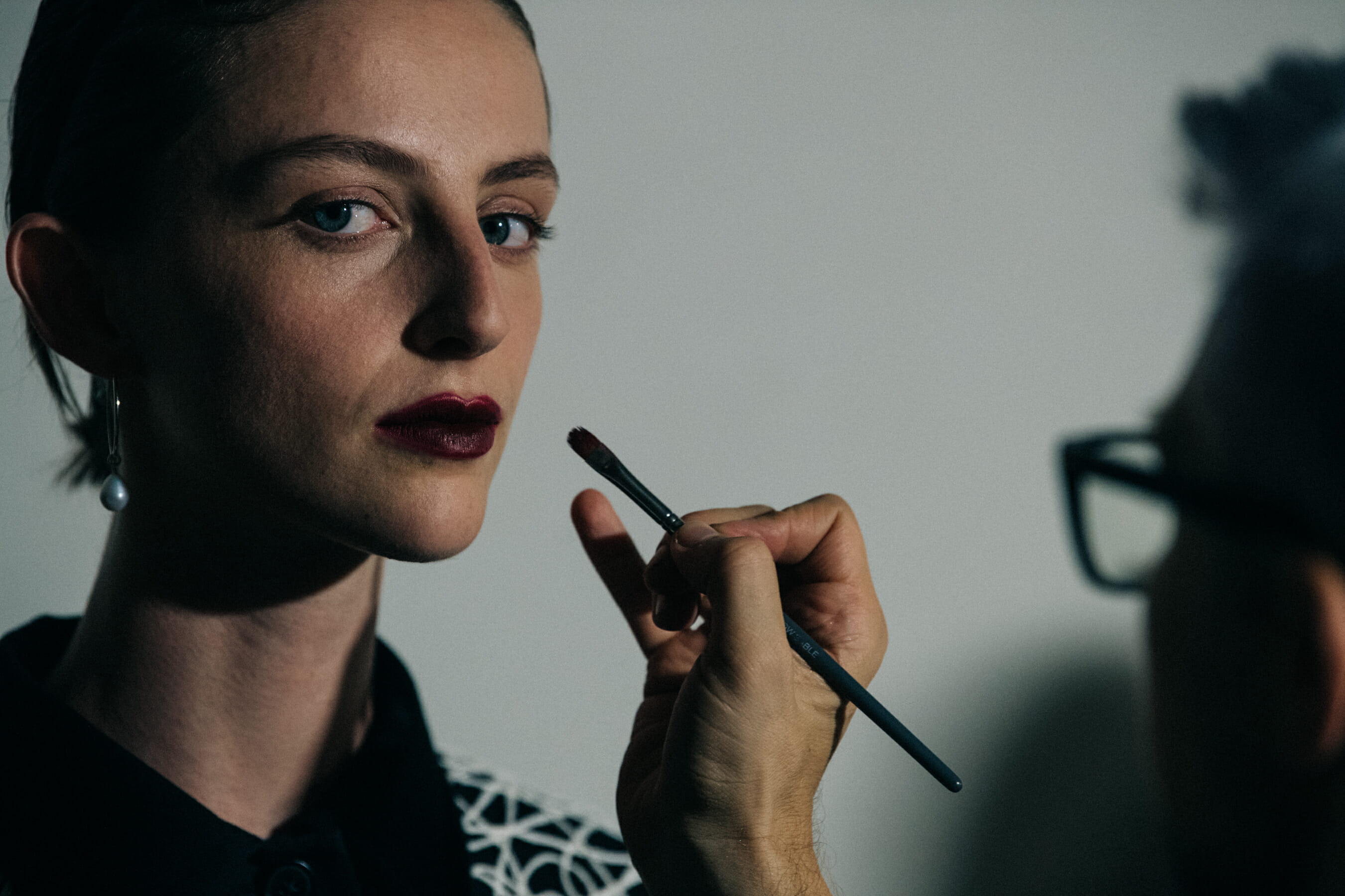 Models in hair and makeup at Jil Sander