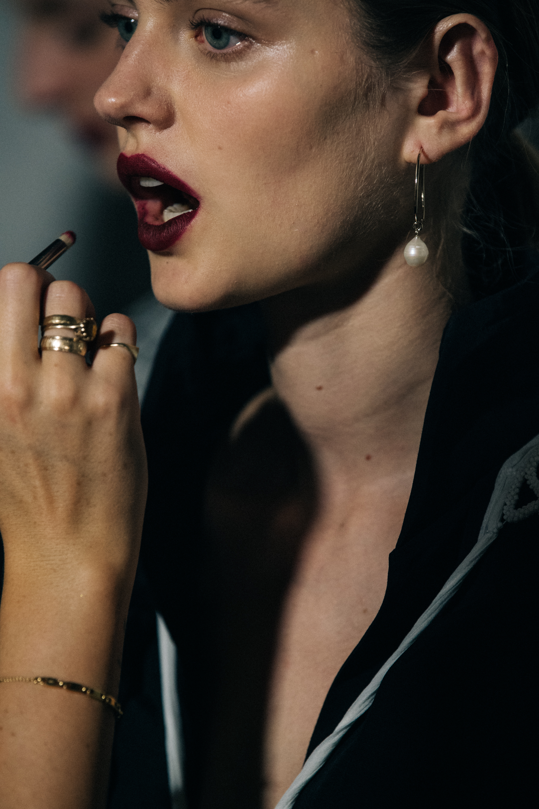 Models in hair and makeup at Jil Sander