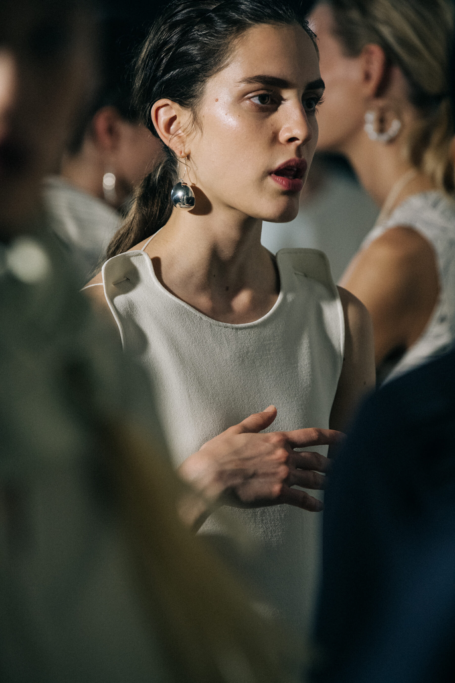 Models wearing white Jil Sander outfits