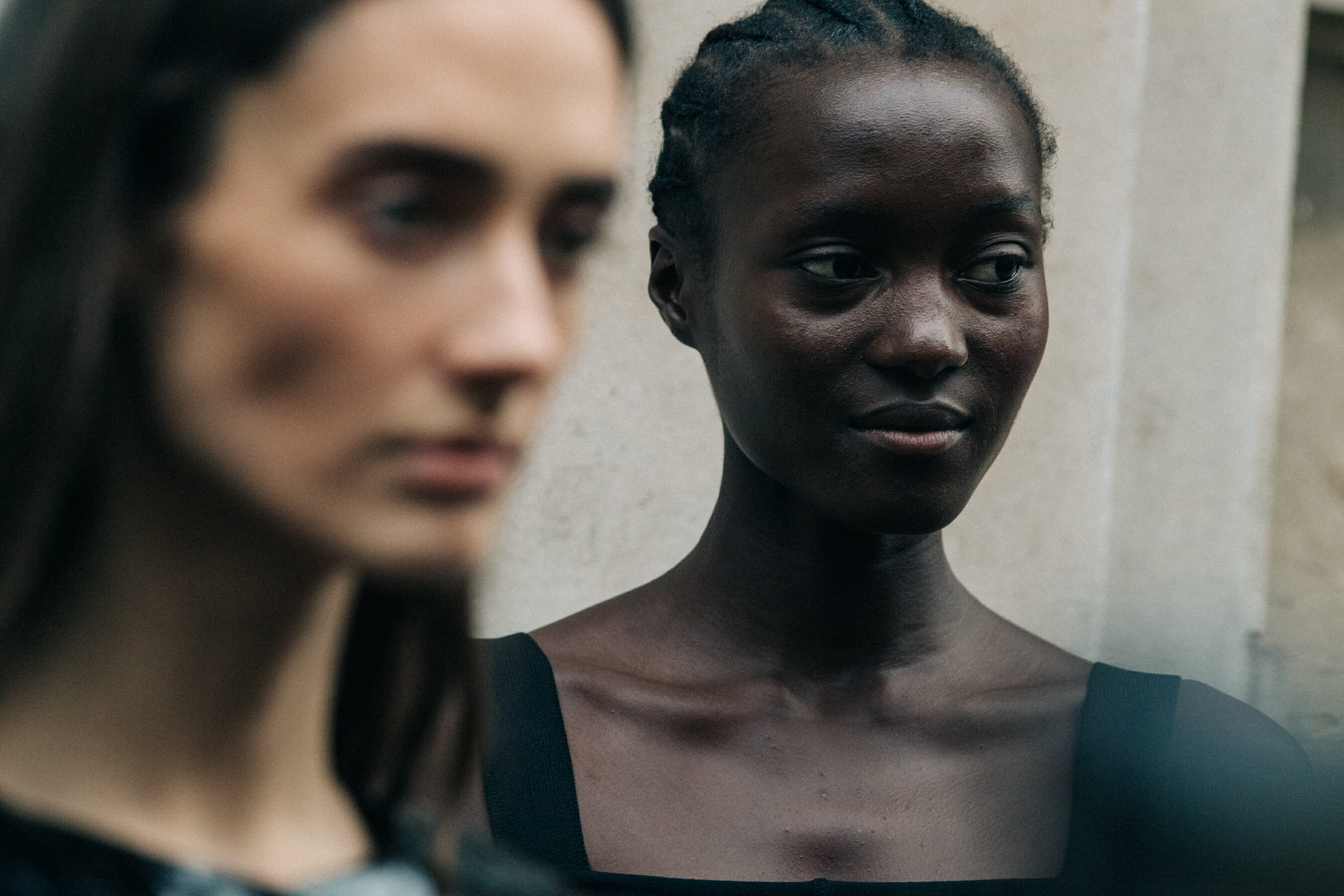 Model wearing black dress at Lemaire