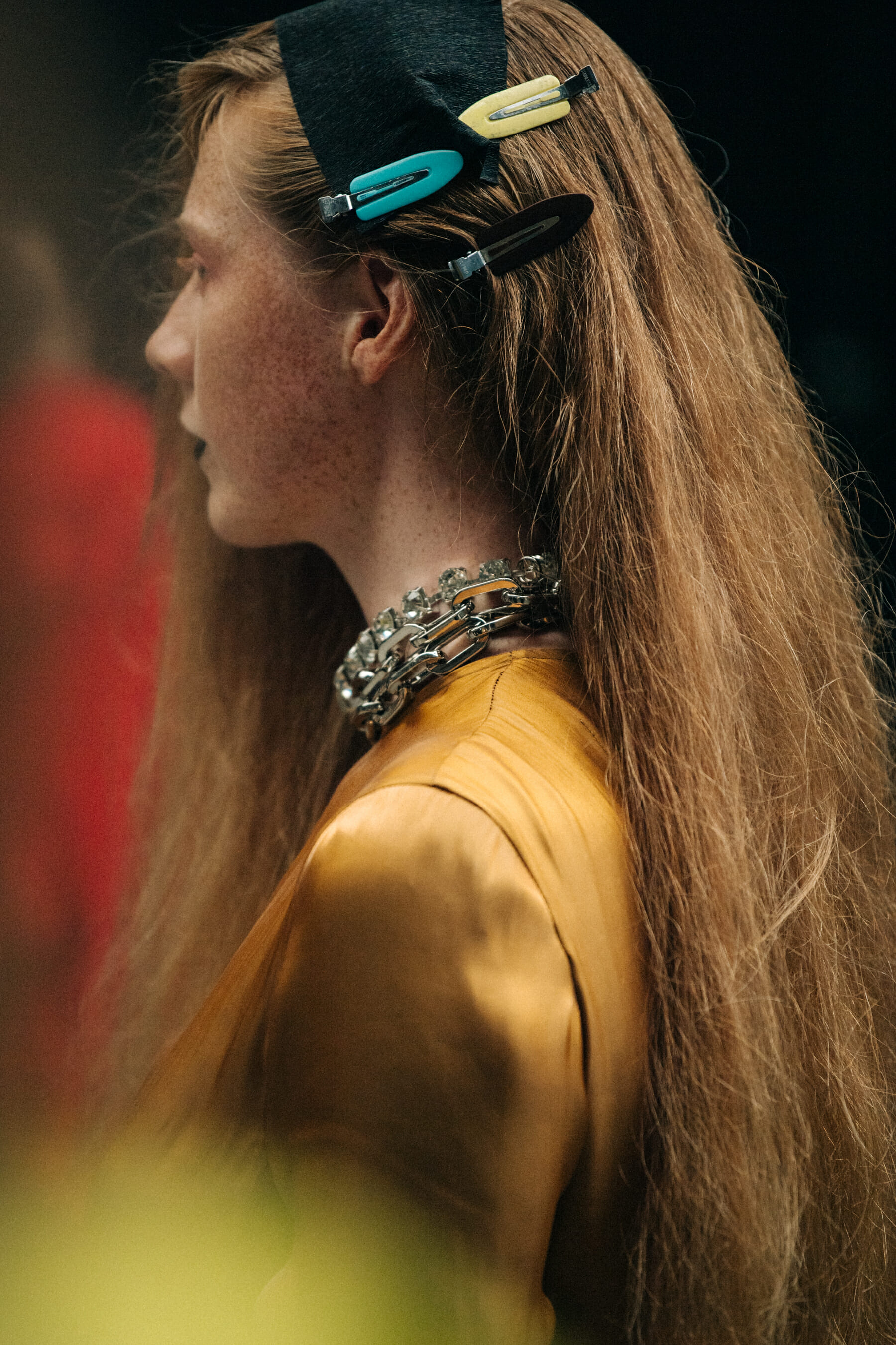 Model wearing yellow backstage at Marques Almeida