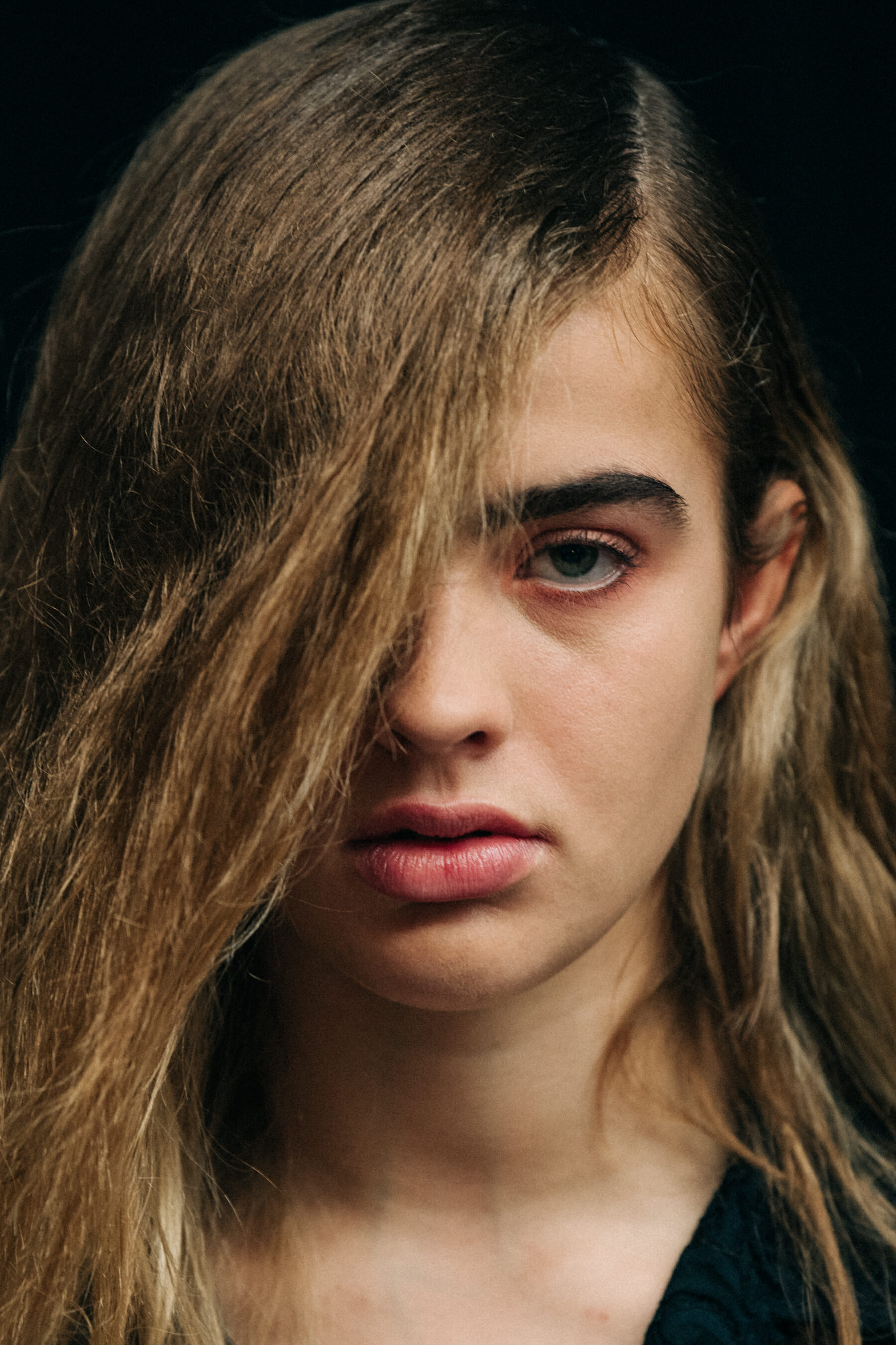 Portrait of model with big side fringe