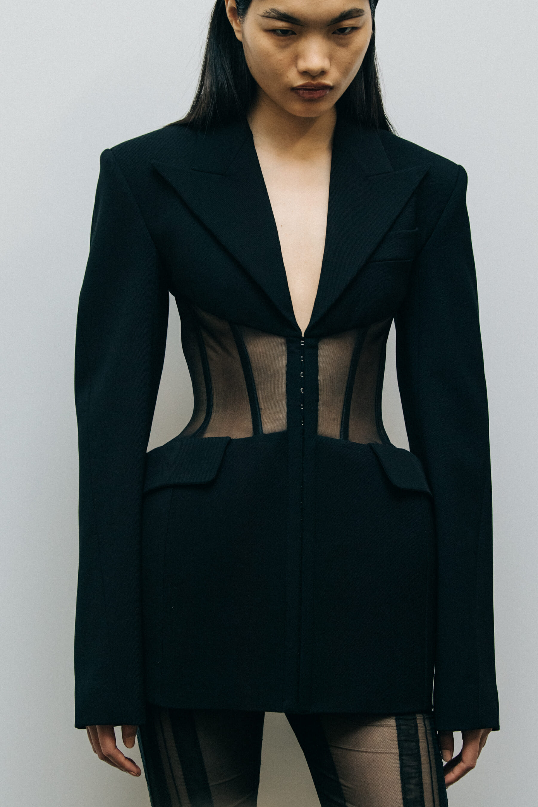 Models wearing black Mugler outfit