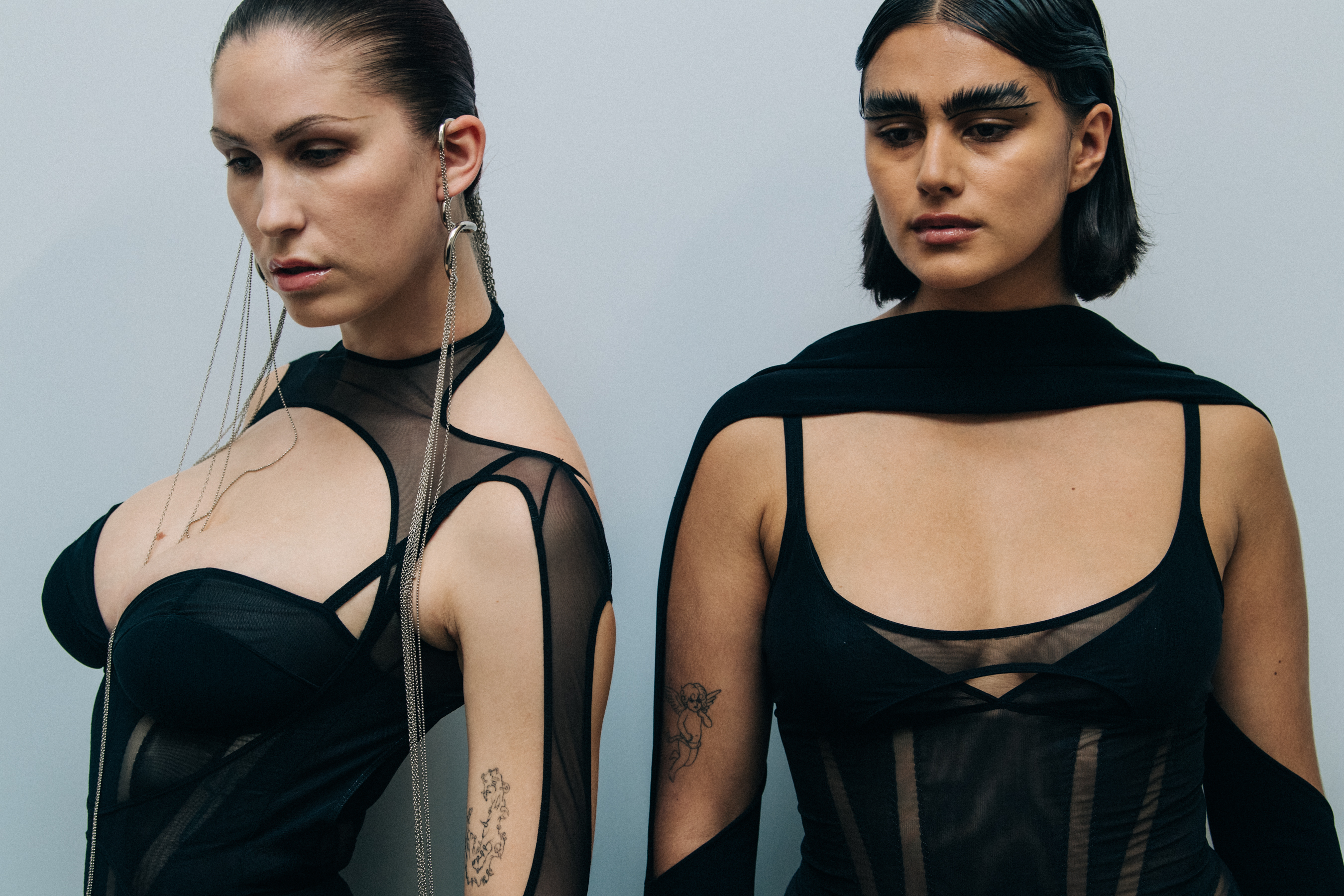 Models wearing black Mugler outfit