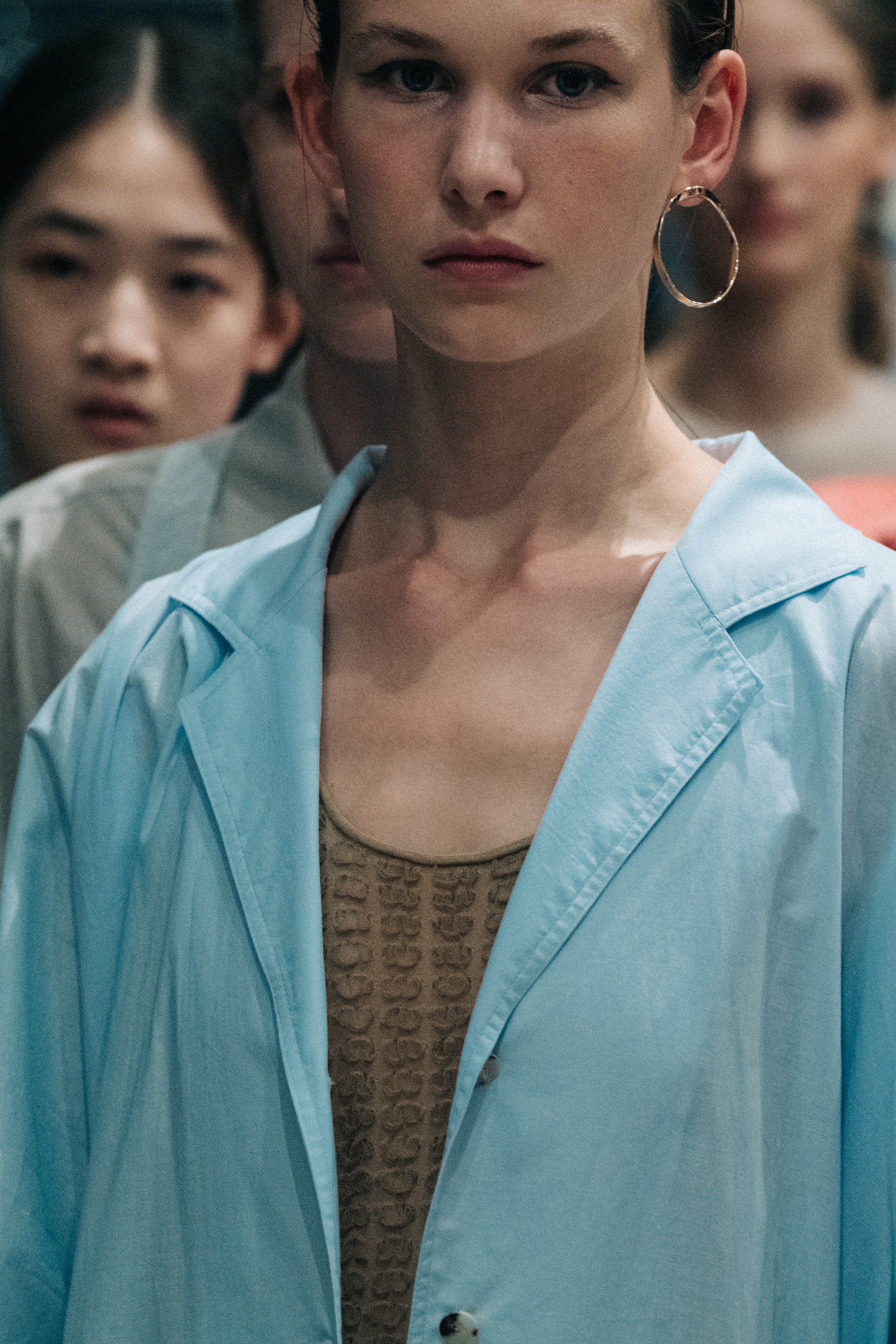 Model wearing blue outfit at Nehera