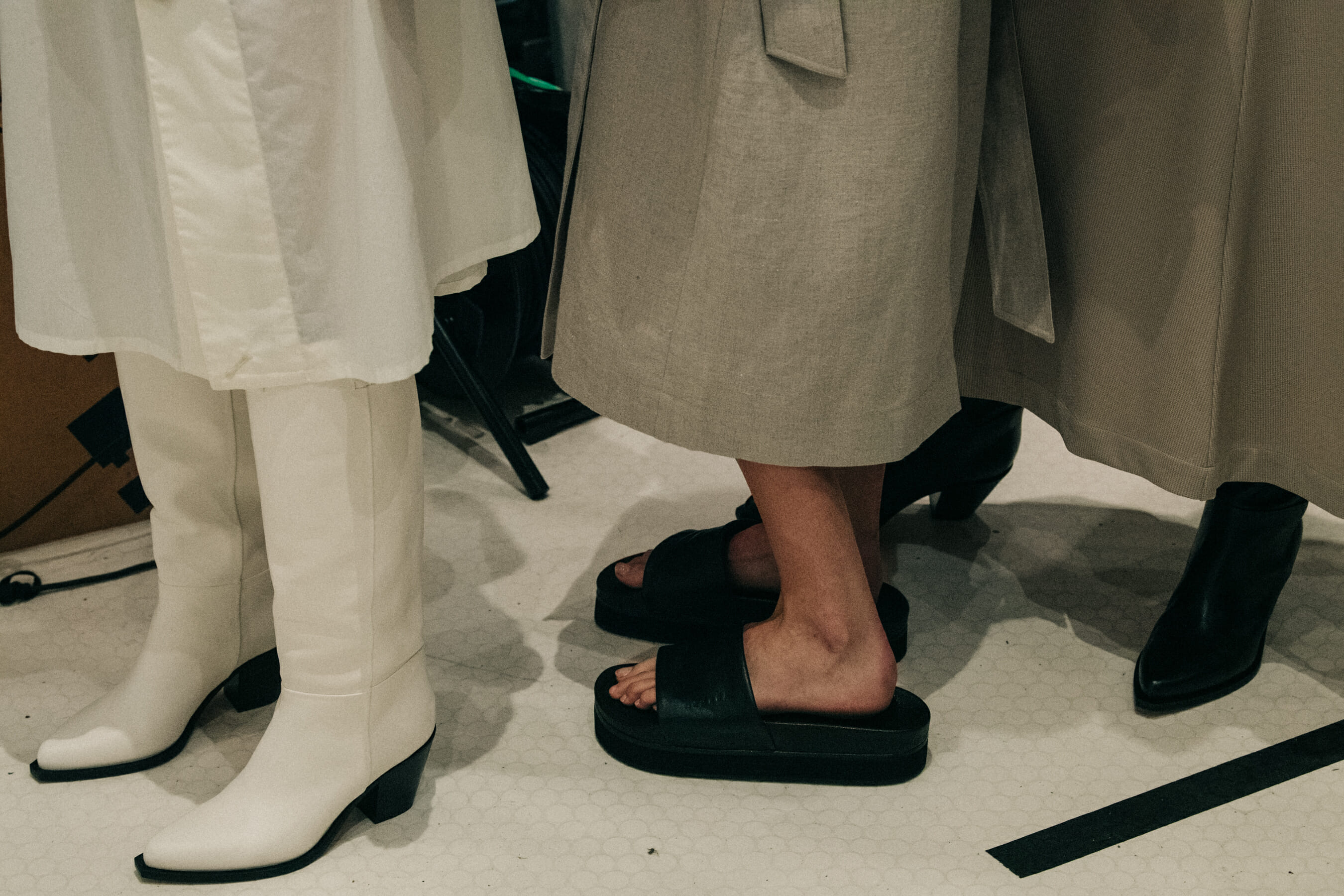 Models wearing white outfit at Nehera