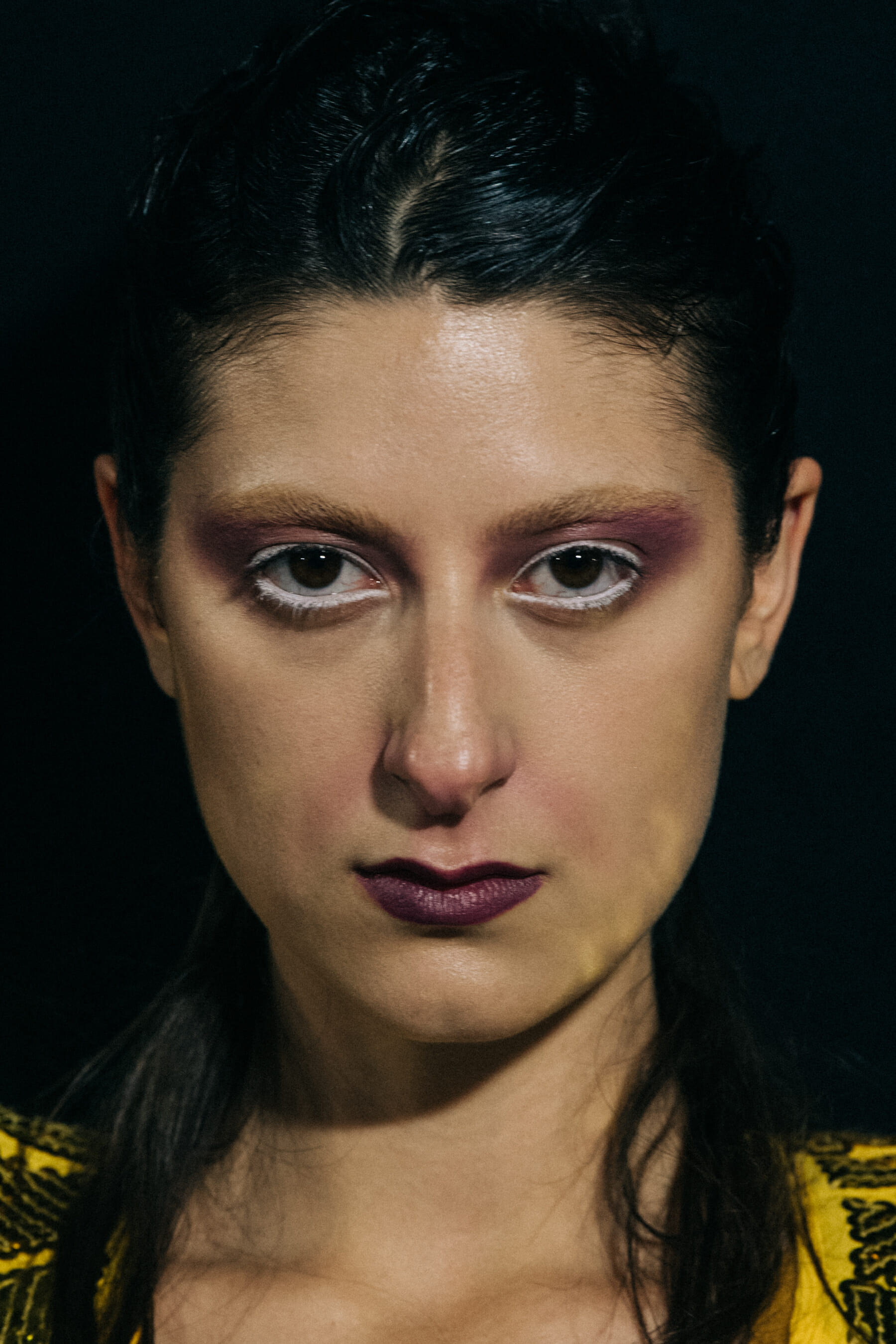 Portrait of model wearing eye makeup