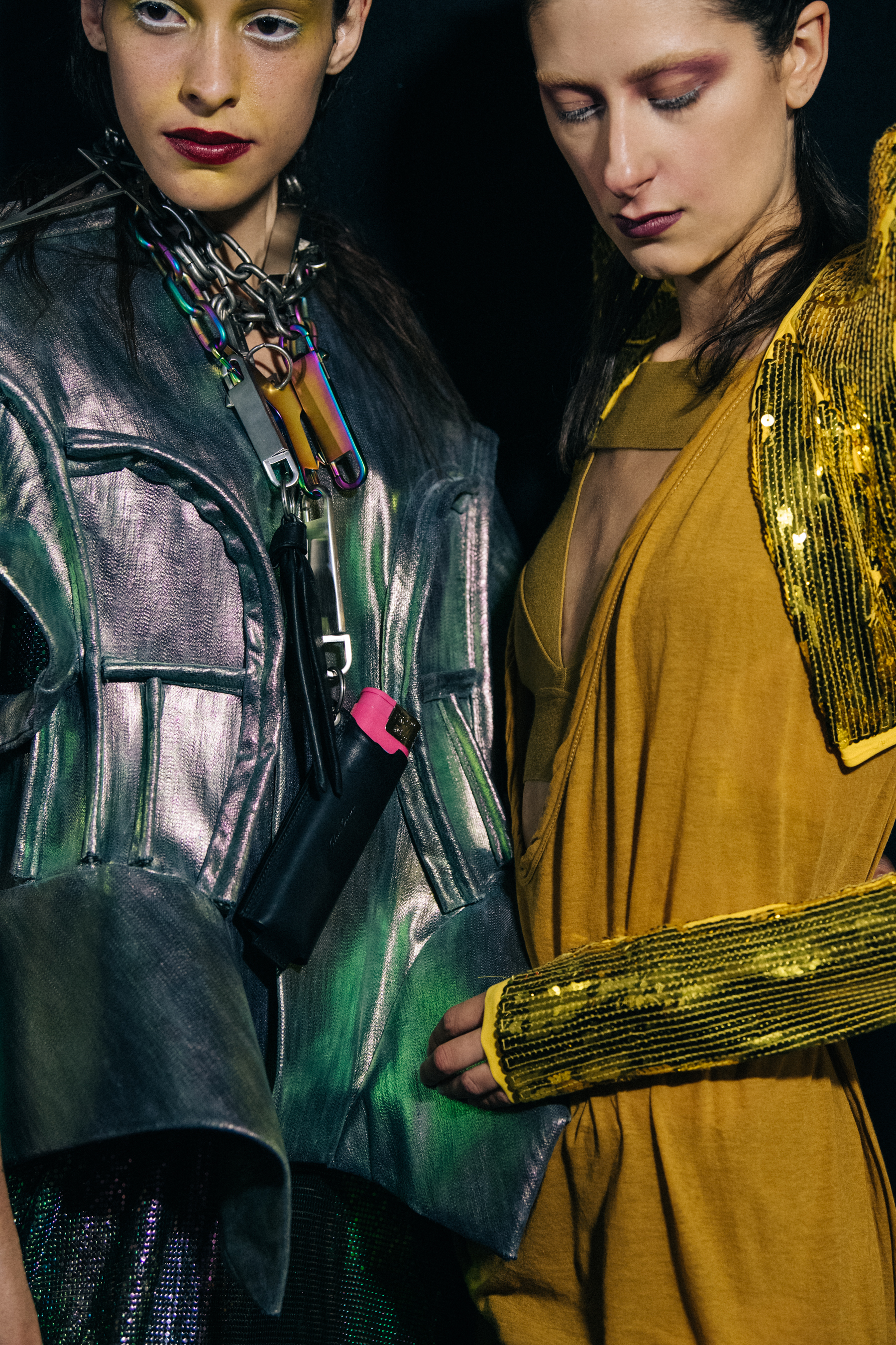 Models wearing yellow outfit backstage at Rick Owens