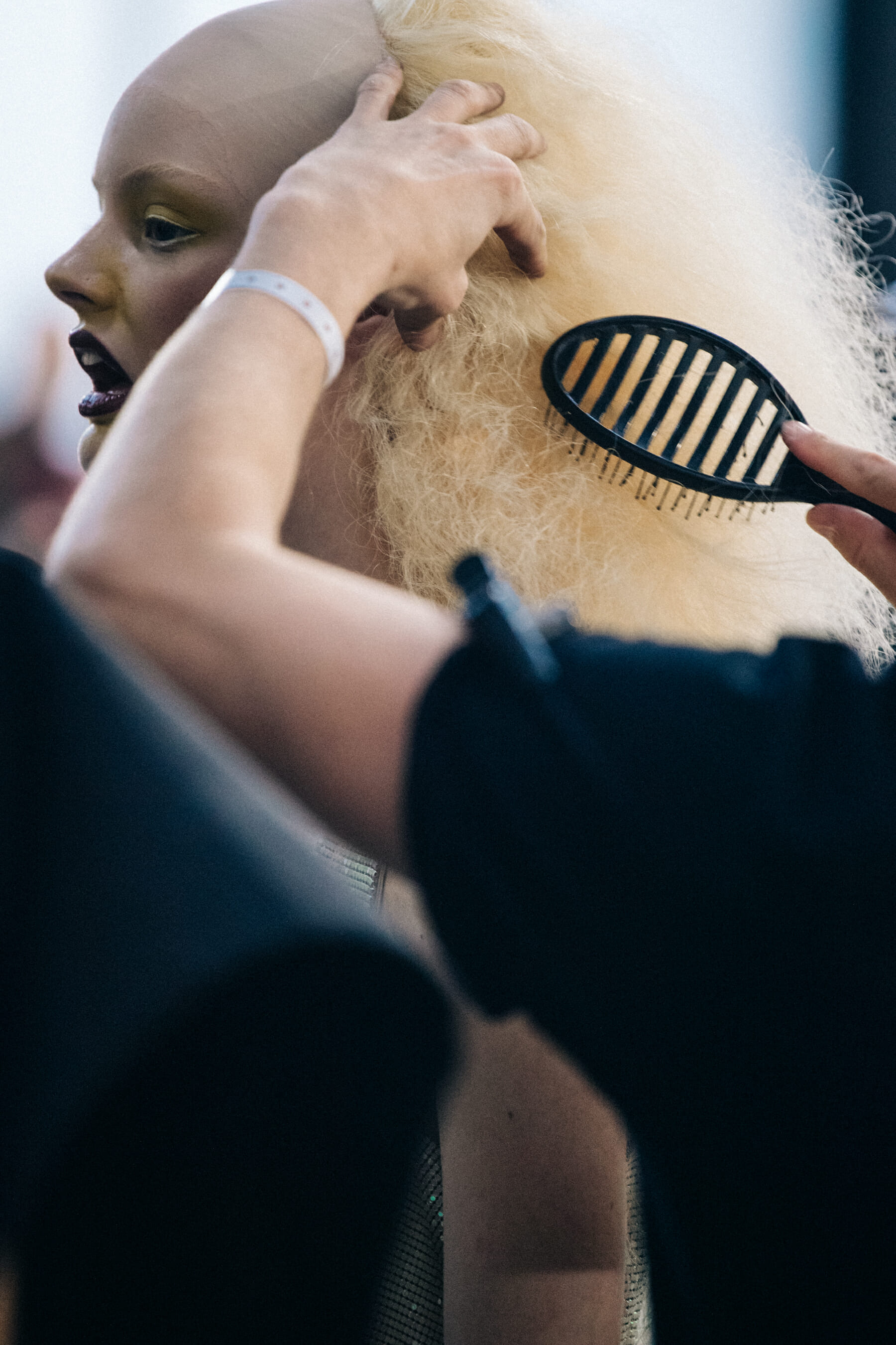 Model wearing blonde wig at Rick Owens
