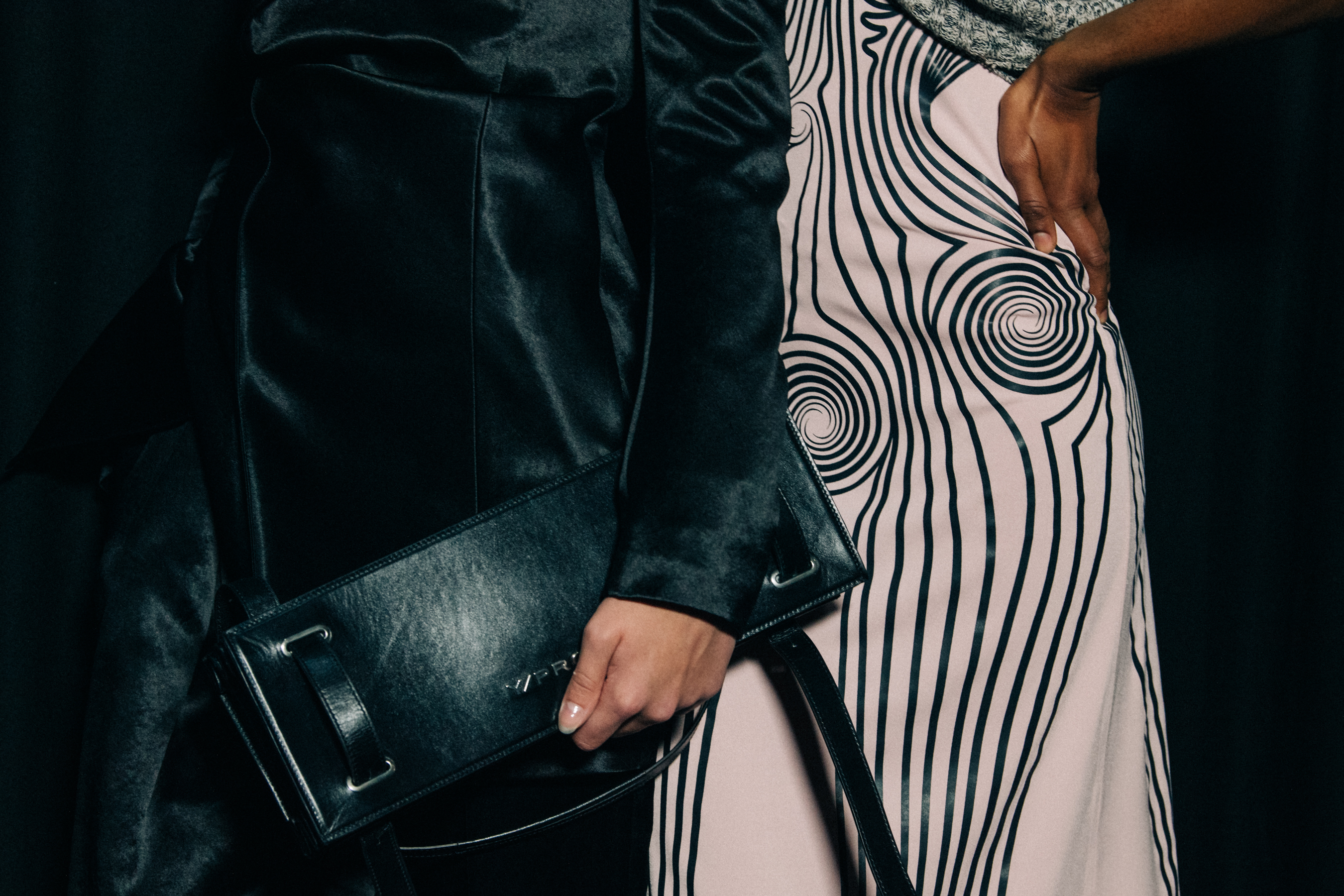 Models wearing black outfits at Y/Project