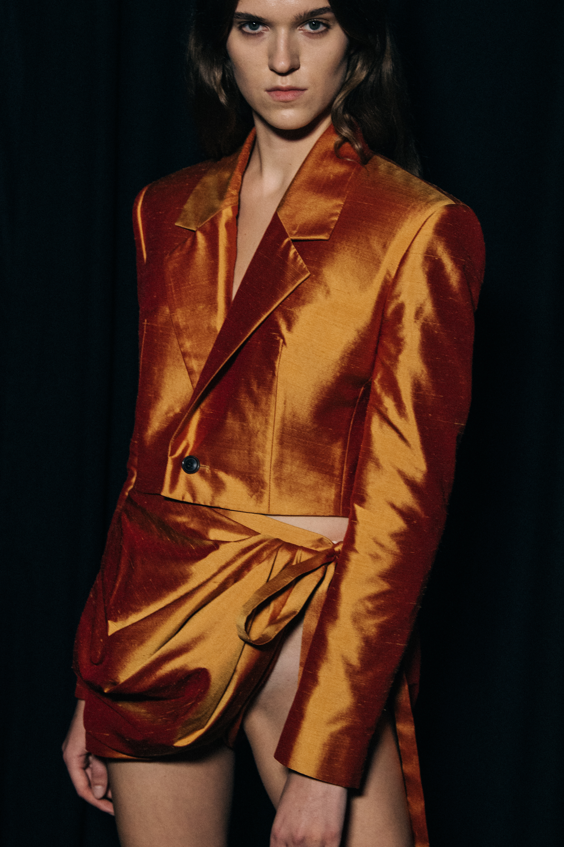 Model wearing orange outfit at Y/Project