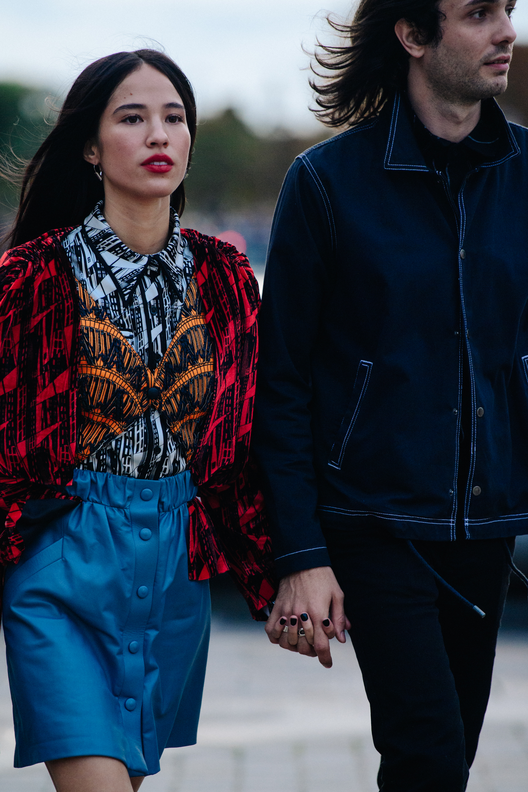 Couple wearing Louis Vuitton