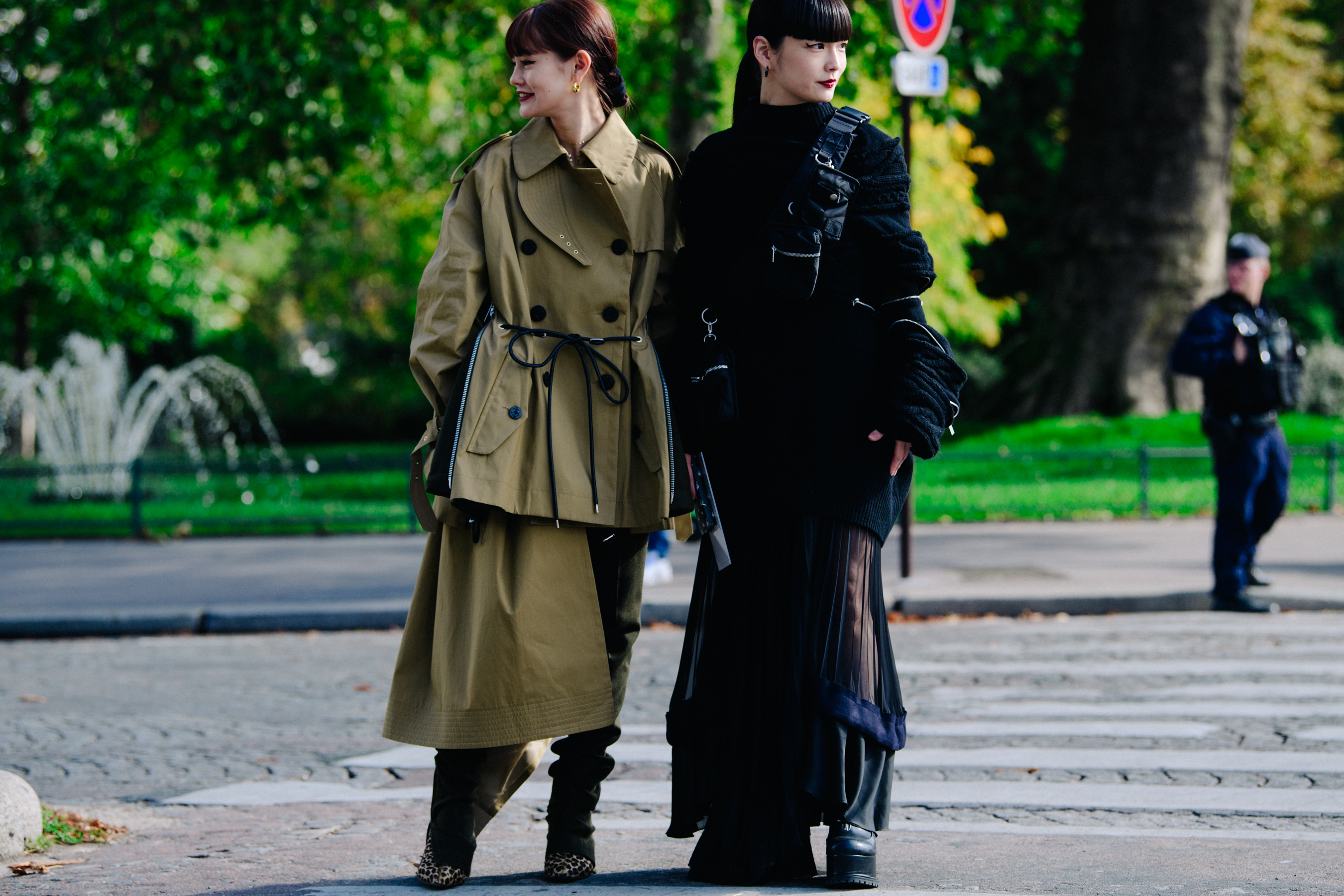 Two Japanese women wearing long coats