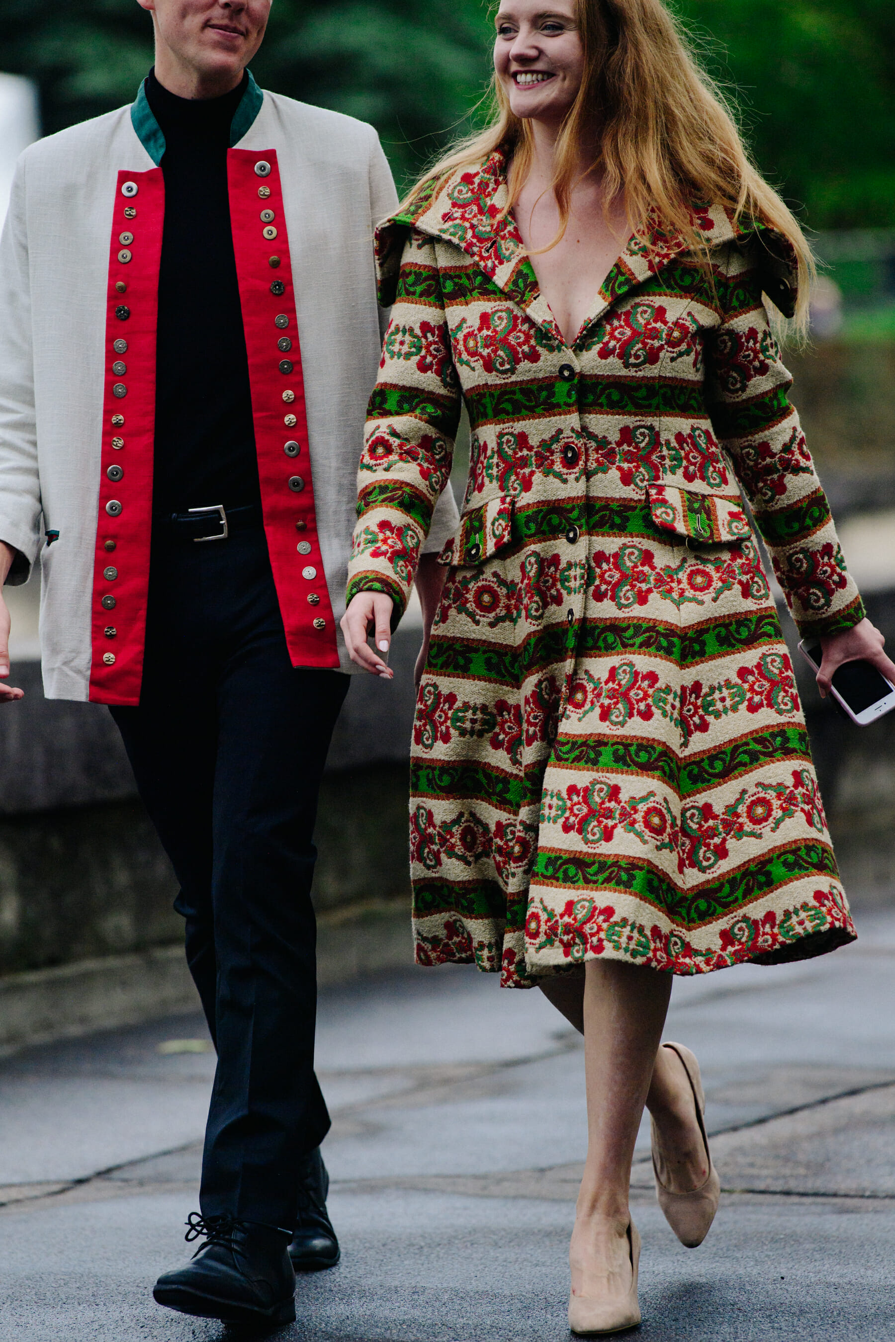 Couple wearing light coats