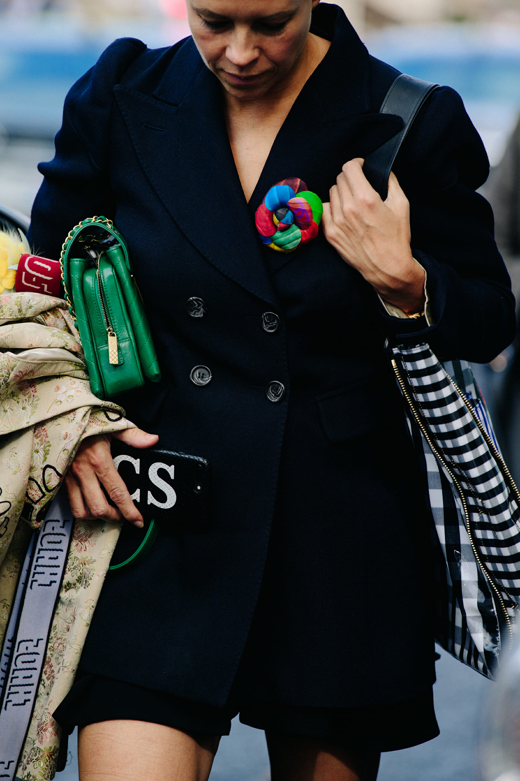 Woman wearing colourful brooch