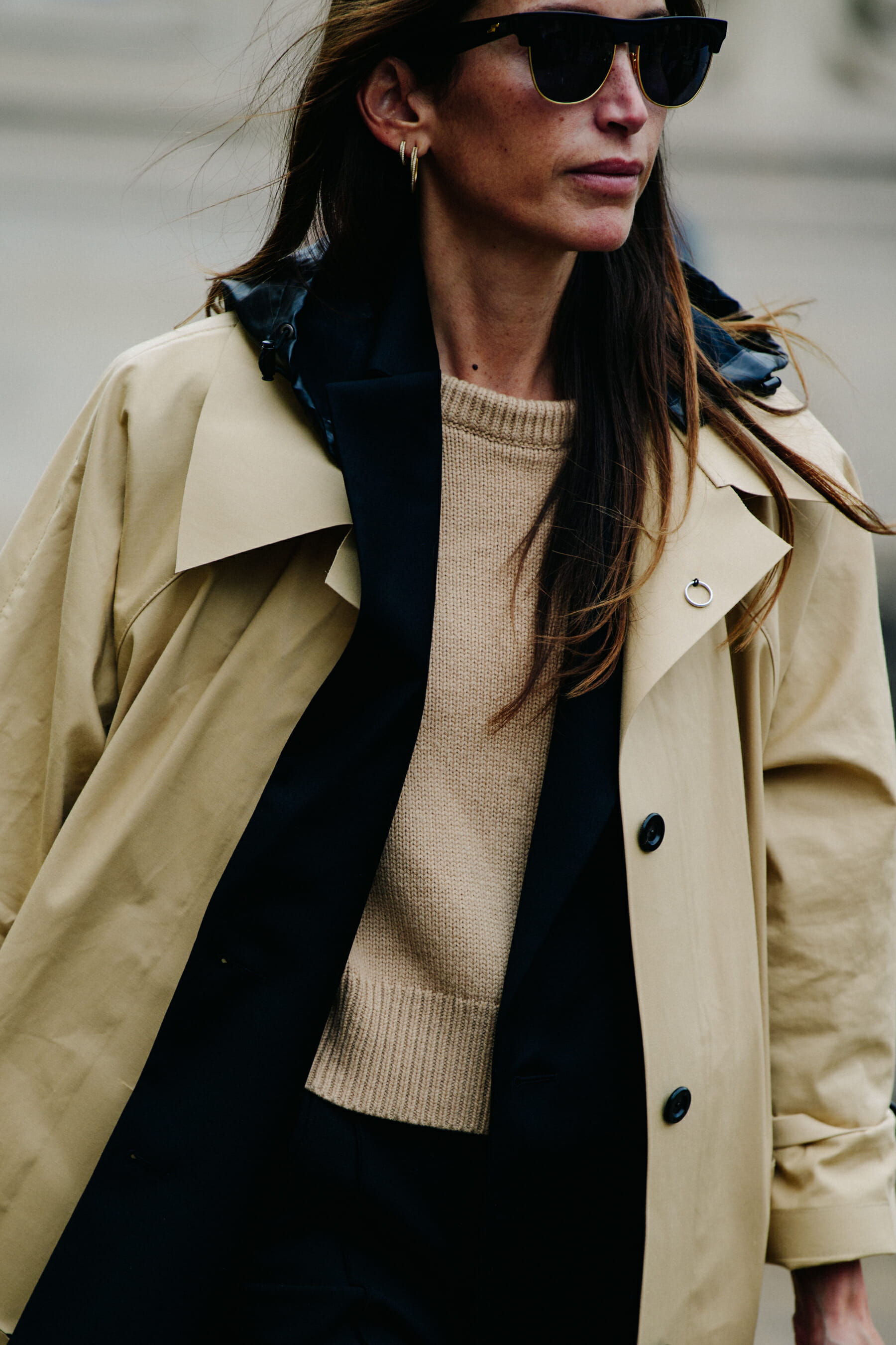 Woman wearing tan jumper