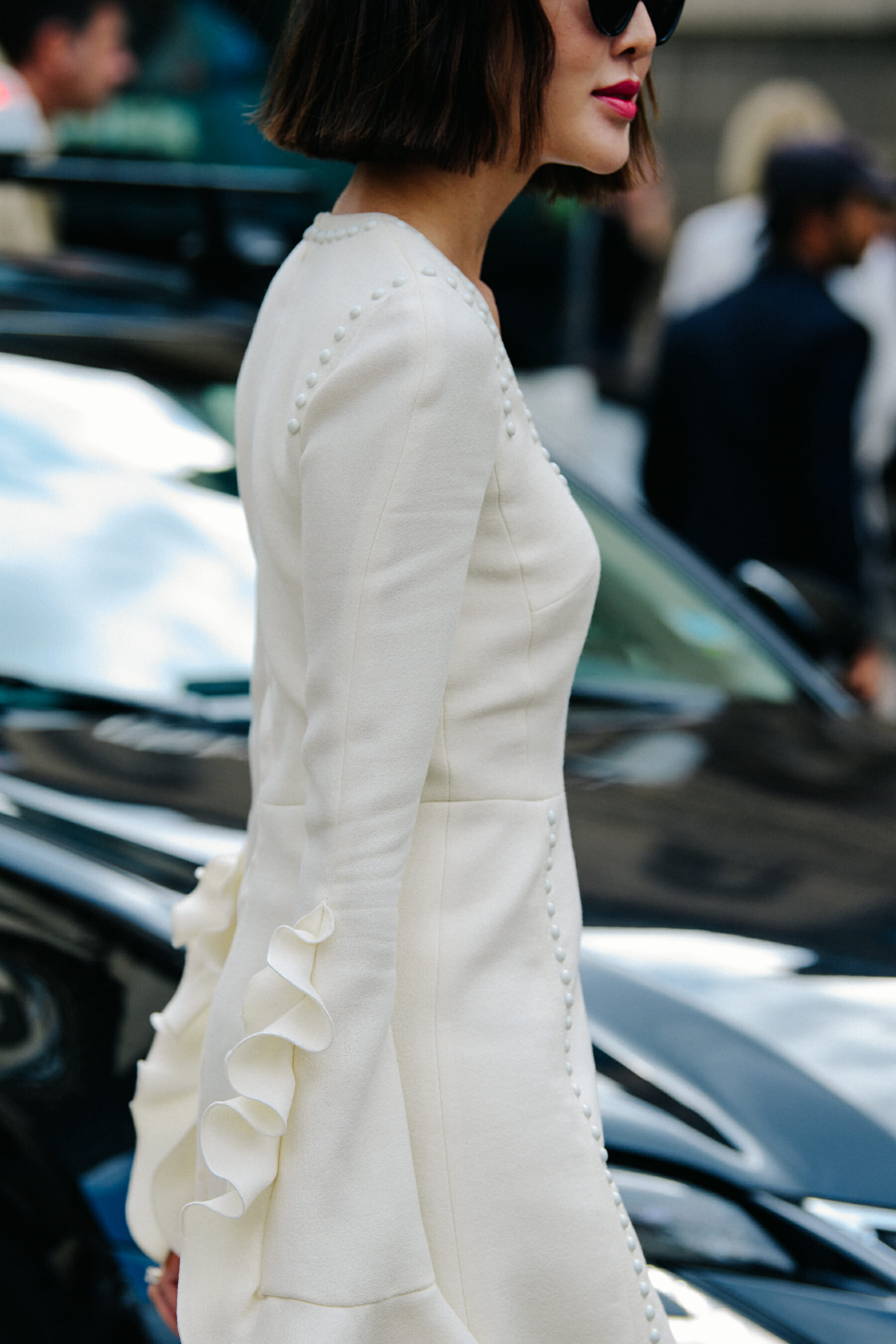 Woman wearing white coat