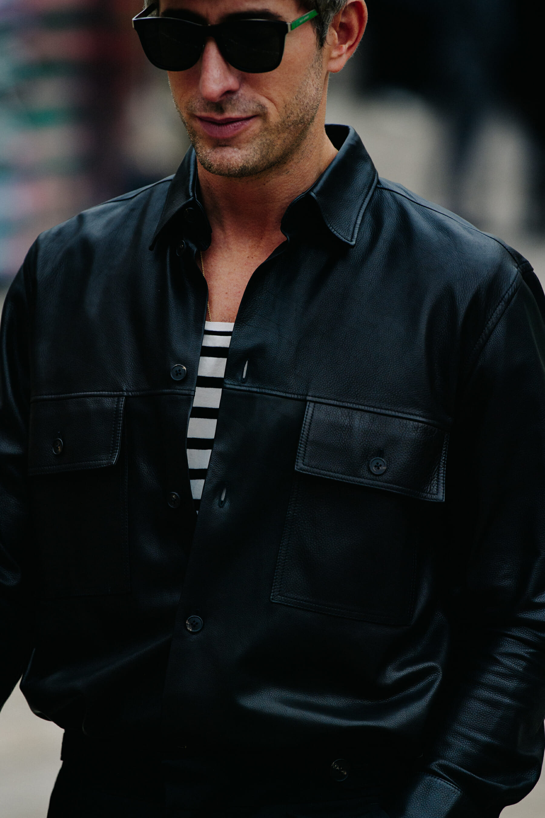 Man wearing leather shirt