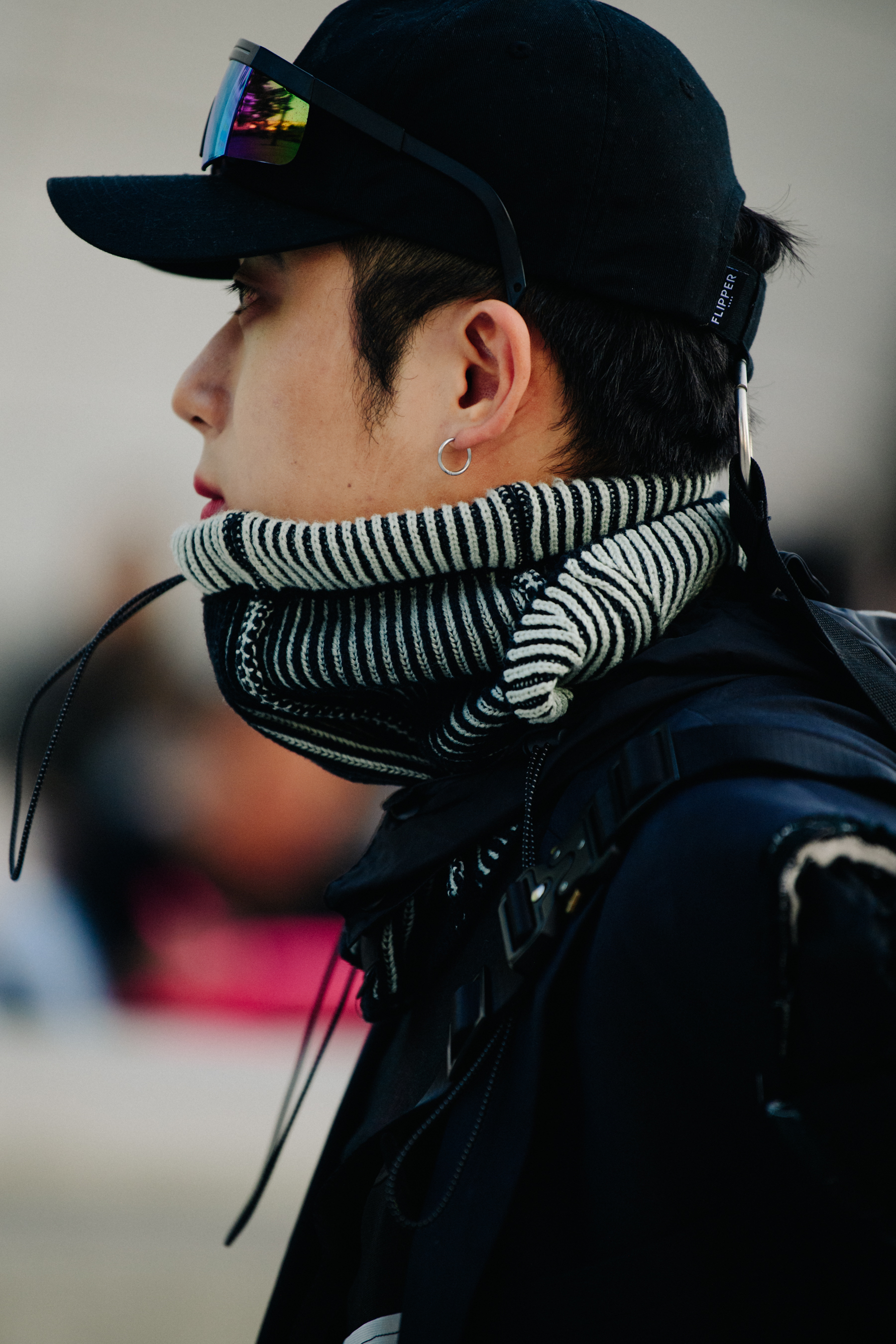Man wearing black cap