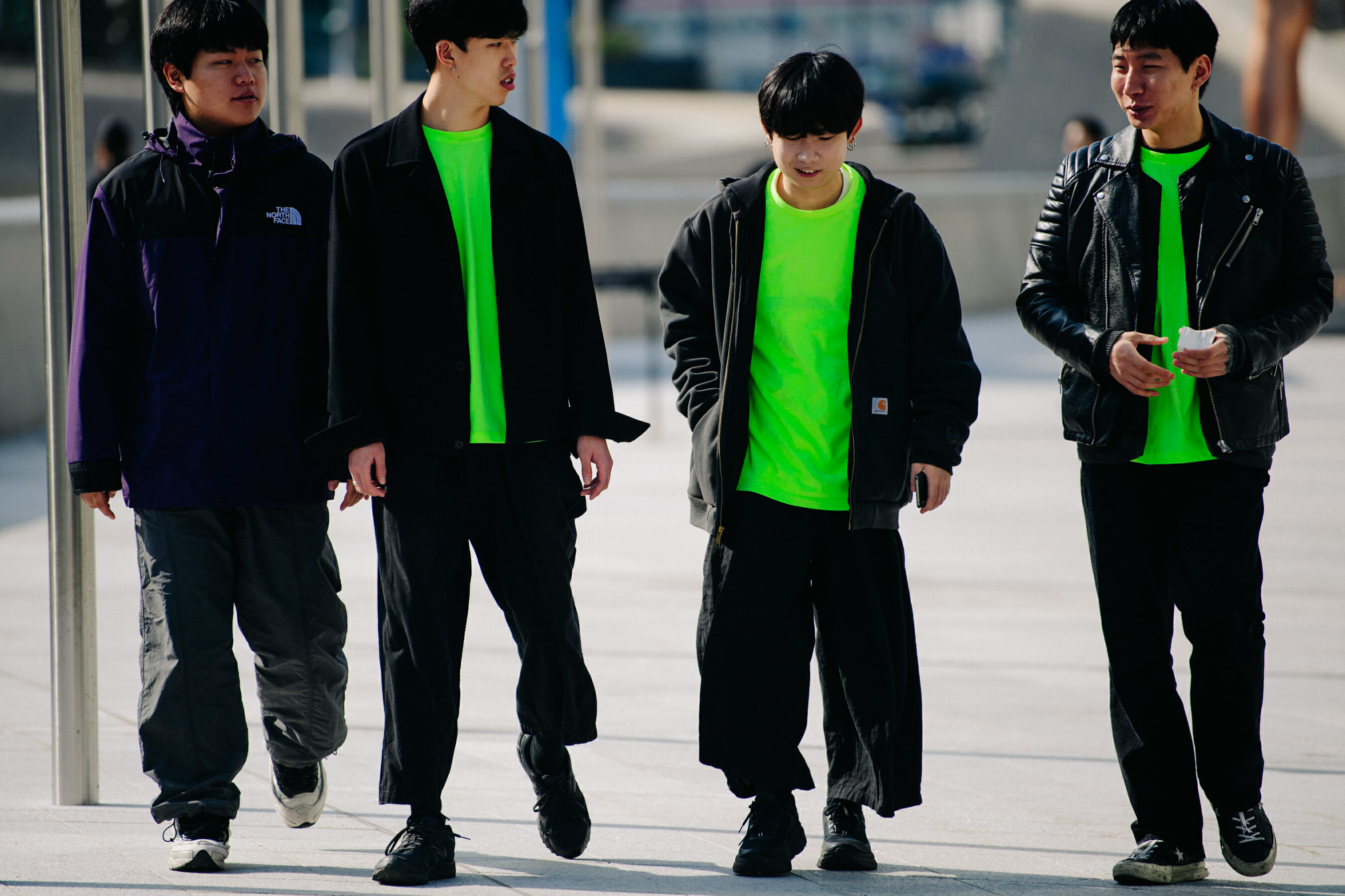 Men wearing bright green tee shirts