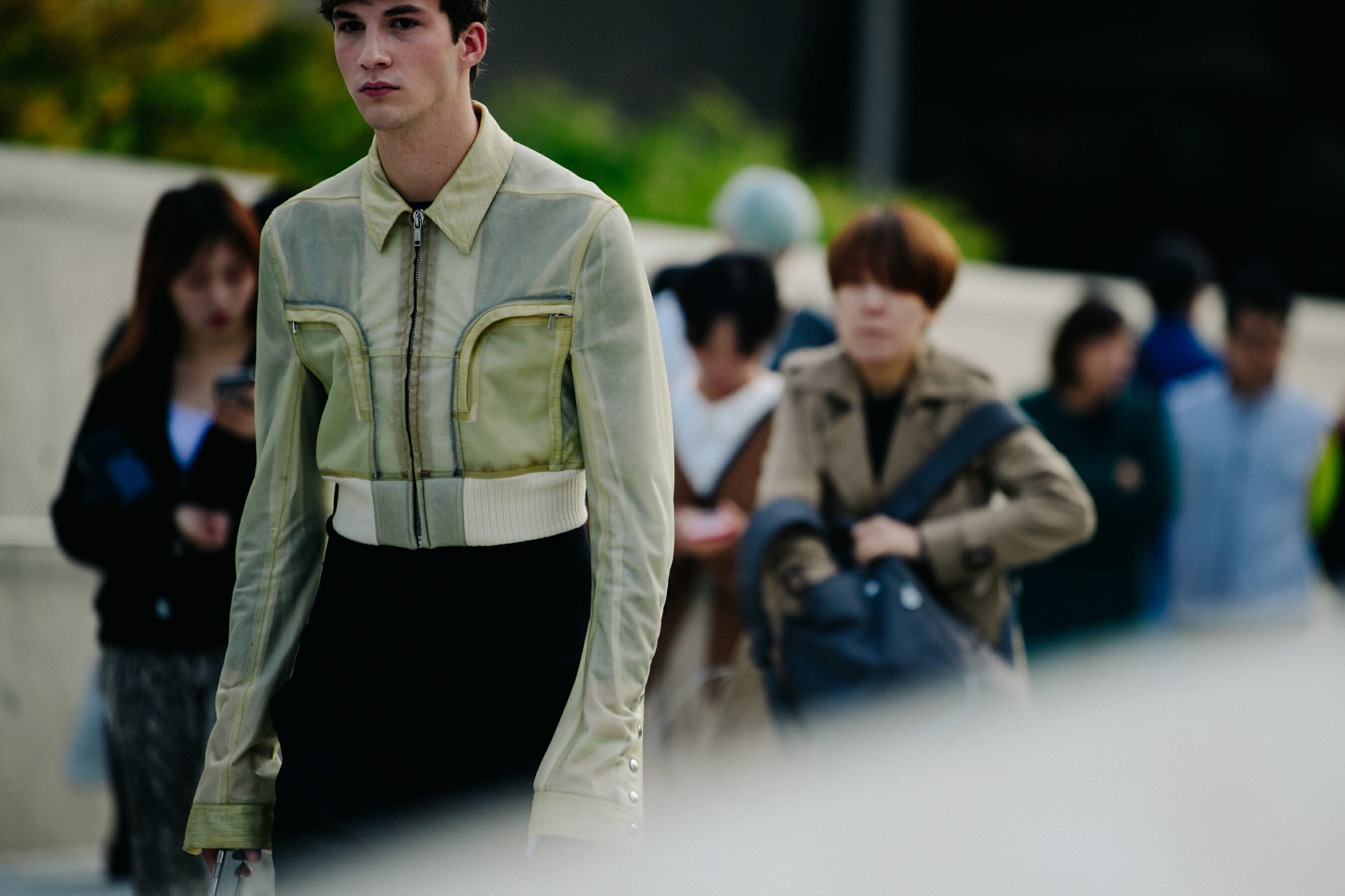 Man wearing yellow jacket