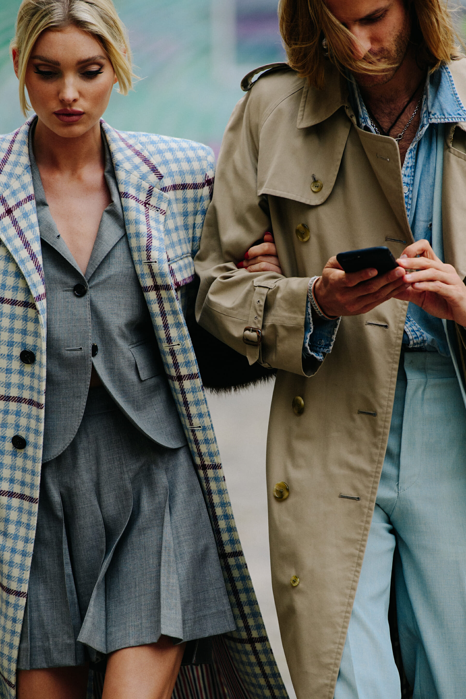 Couple wearing long coats