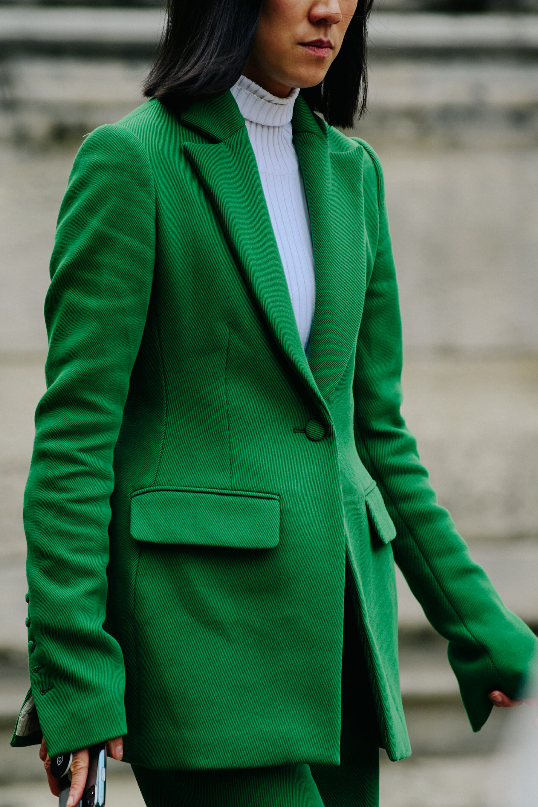 Woman wearing green jacket