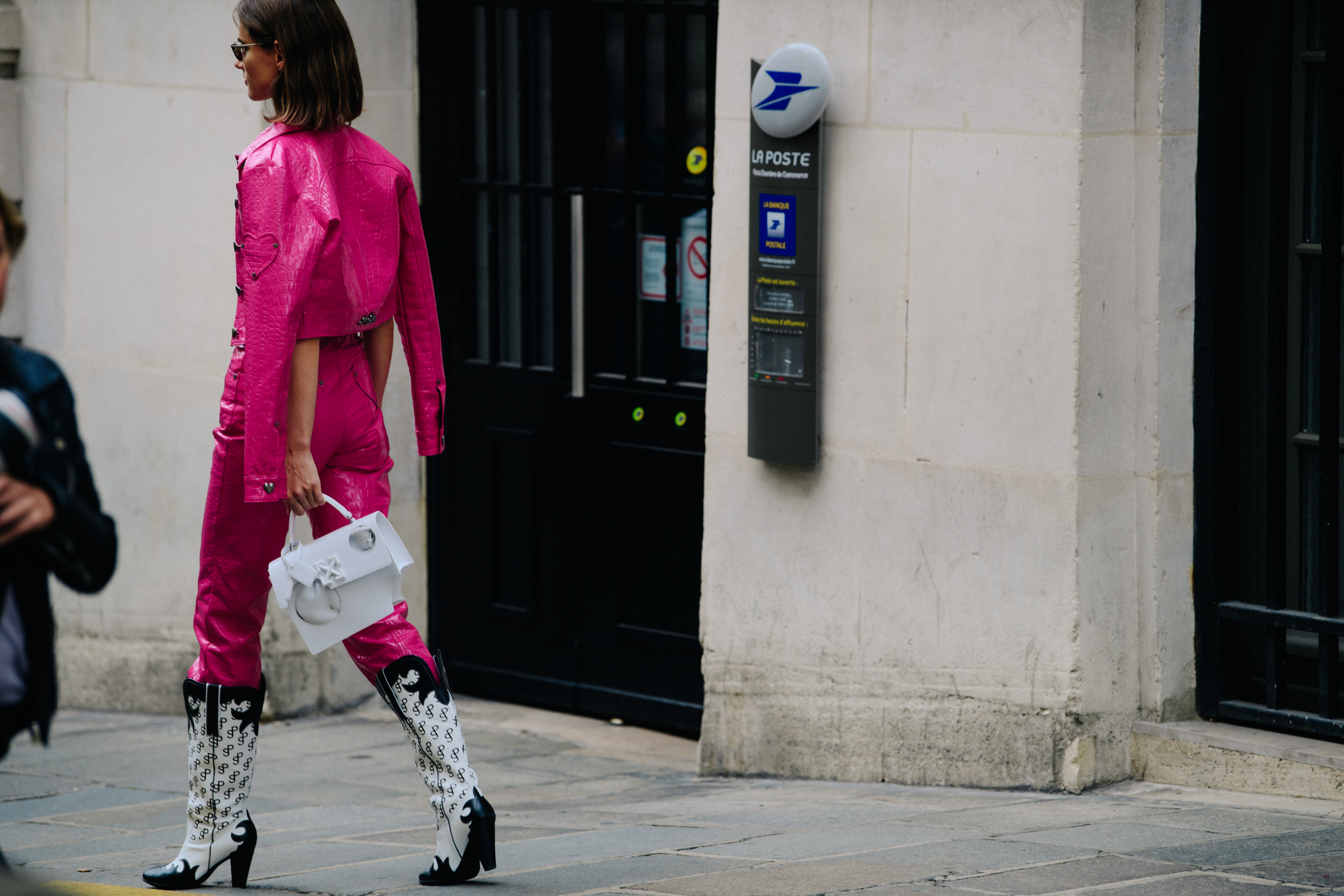 Model wearing pink outfit
