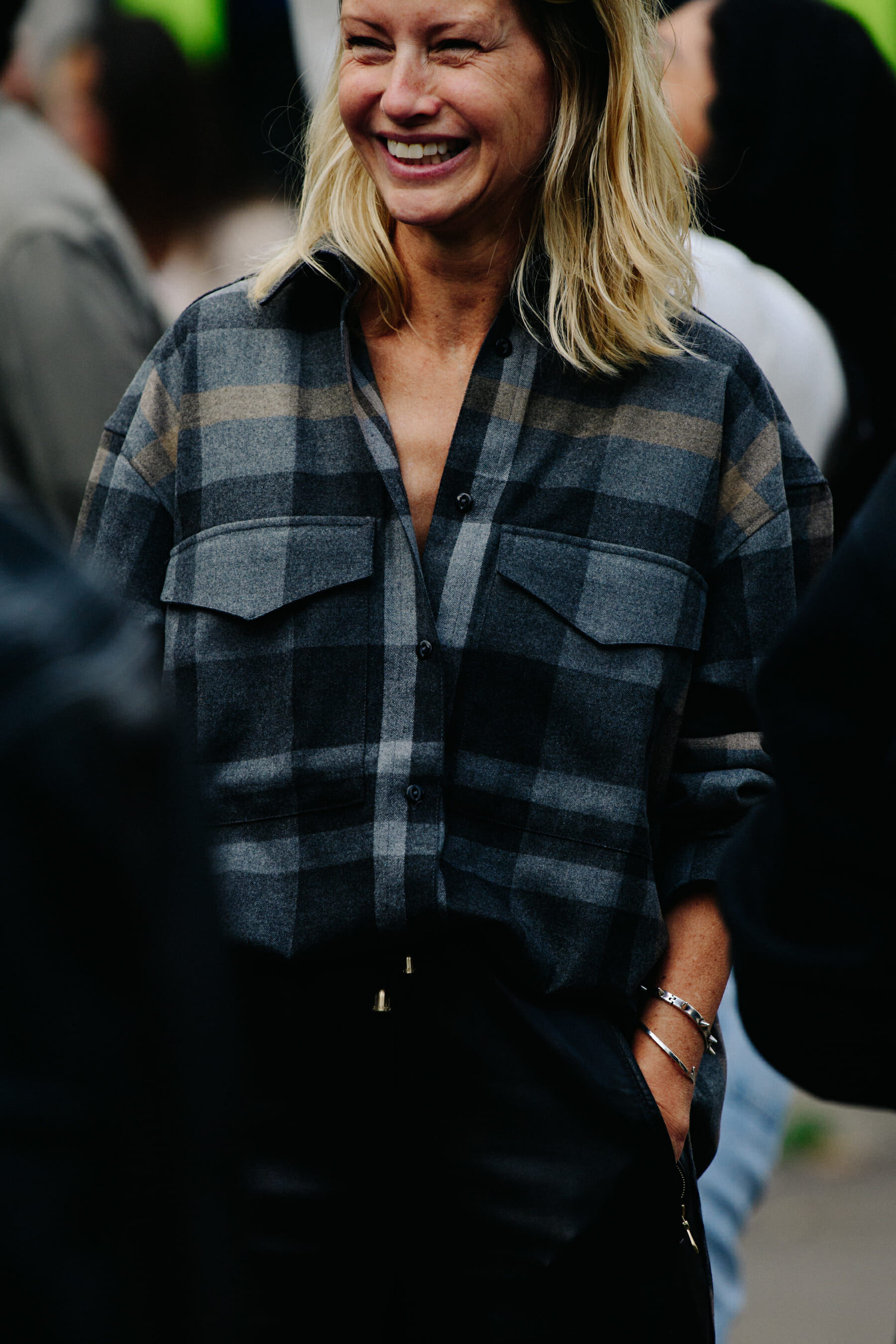 CFO wearing grey check shirt